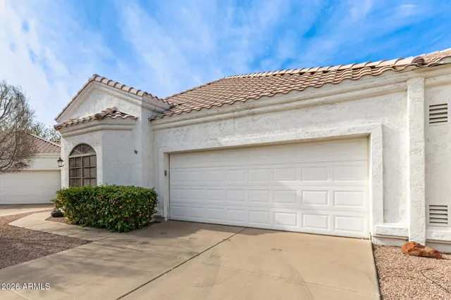a view of entryway and front of a house