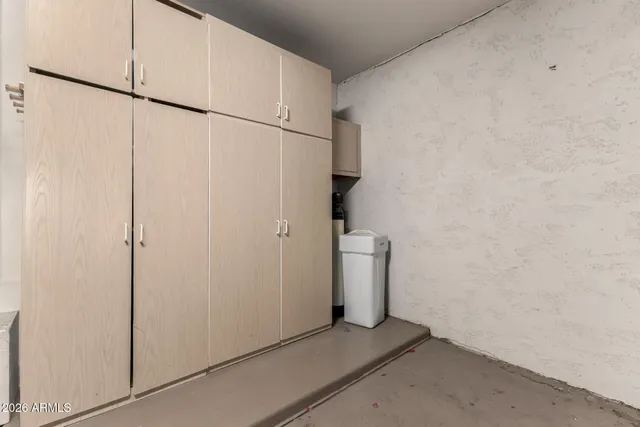 a view of a storage & utility room with closet