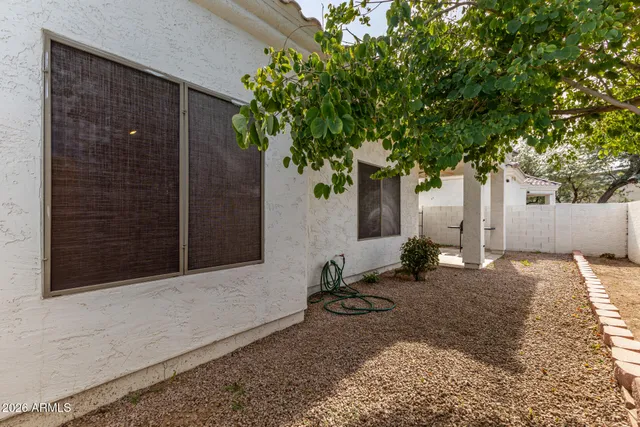 a backyard of a house with seating space