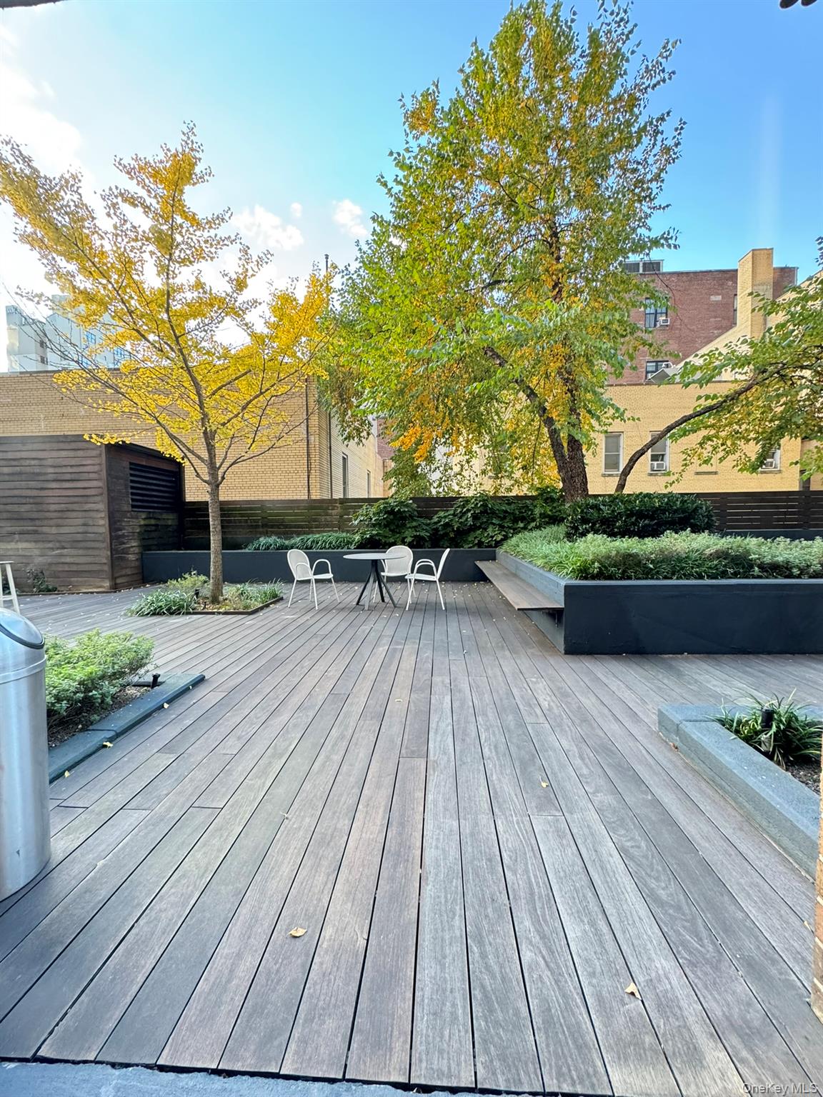 301 West 53rd Street, Unit 9K Manhattan, NY 10019 - Photo 21 of 22 View of wooden terrace