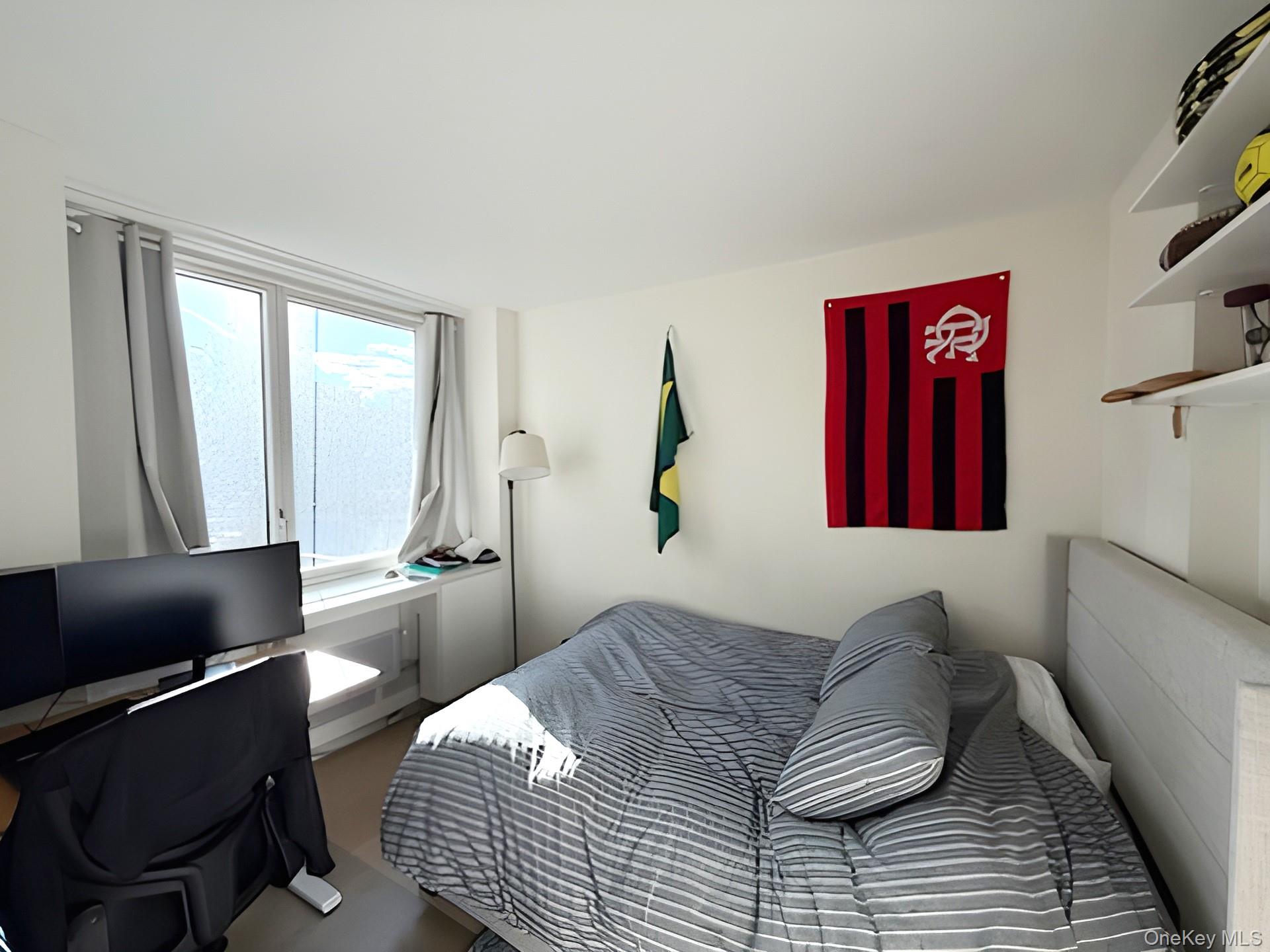 301 West 53rd Street, Unit 9K Manhattan, NY 10019 - Photo 10 of 22 Bedroom with baseboard heating