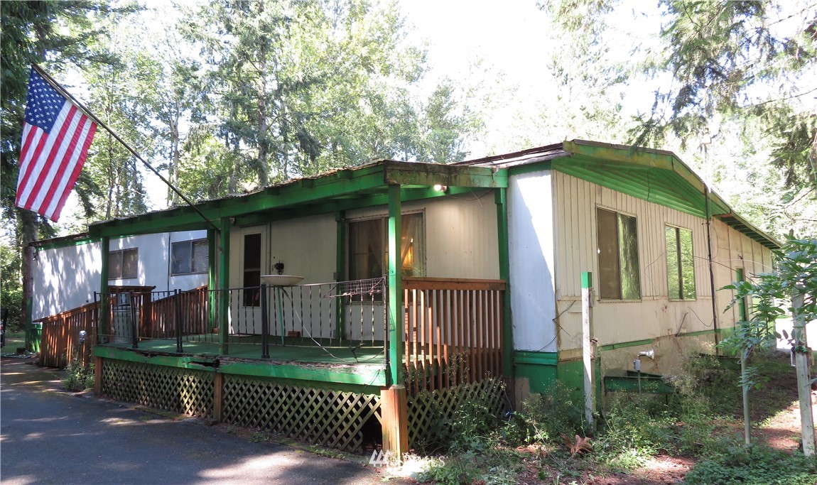 2058 Willeys Lake Road Custer, WA 98240 - Photo 1 of 25 a front view of a house with a garden