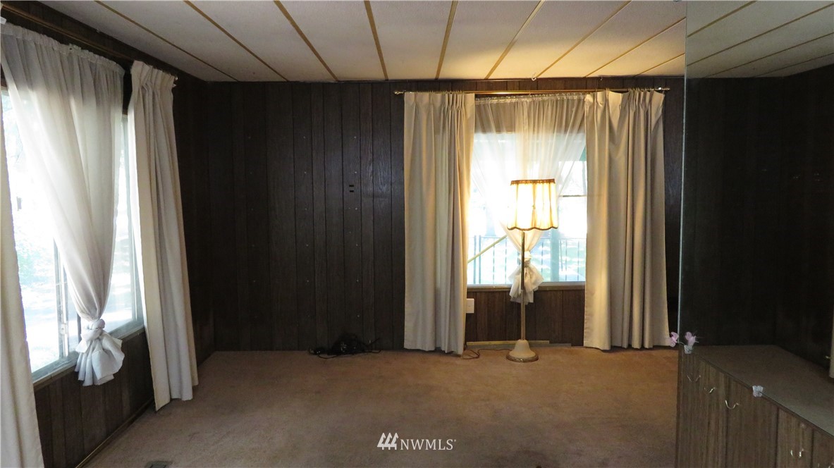 2058 Willeys Lake Road Custer, WA 98240 - Photo 18 of 25 a view of an empty room with a window
