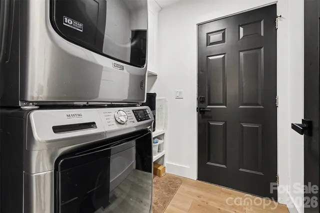 a kitchen with a stove and a microwave