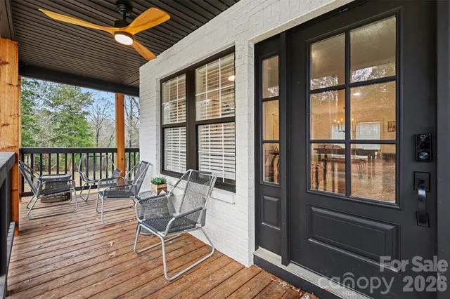 a living room with furniture and windows