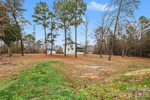 a view of road with trees