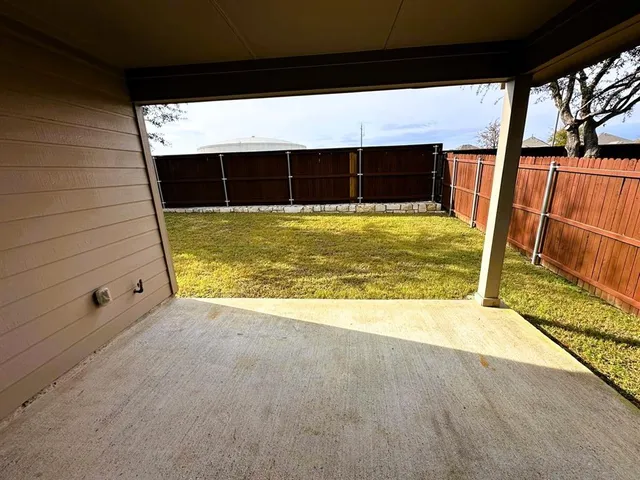 a view of swimming pool with a porch