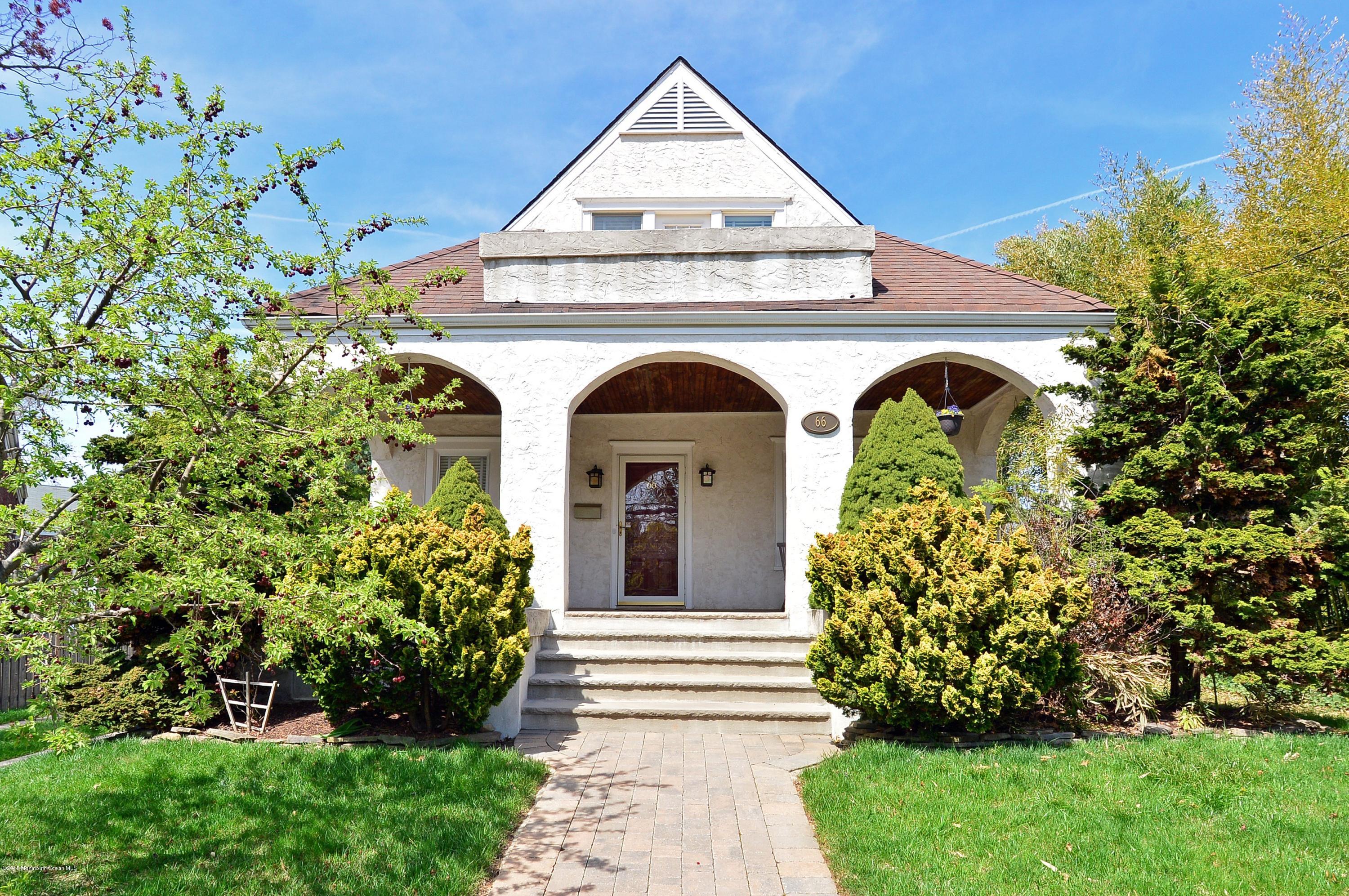 66 Pinckney Road Red Bank, NJ 07701 - Photo 1 of 30 a front view of a house with garden