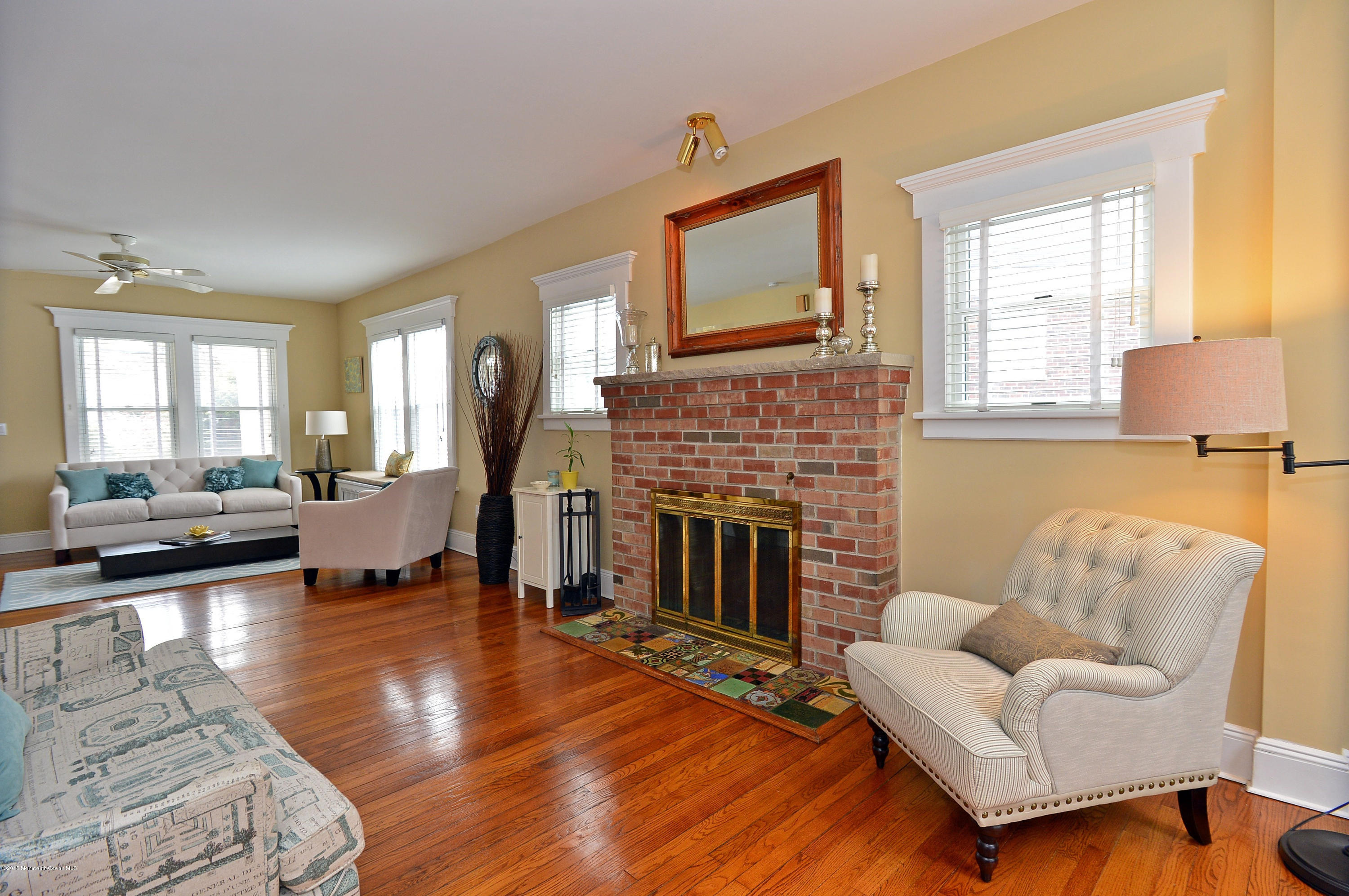 66 Pinckney Road Red Bank, NJ 07701 - Photo 11 of 30 a living room with furniture and a fireplace