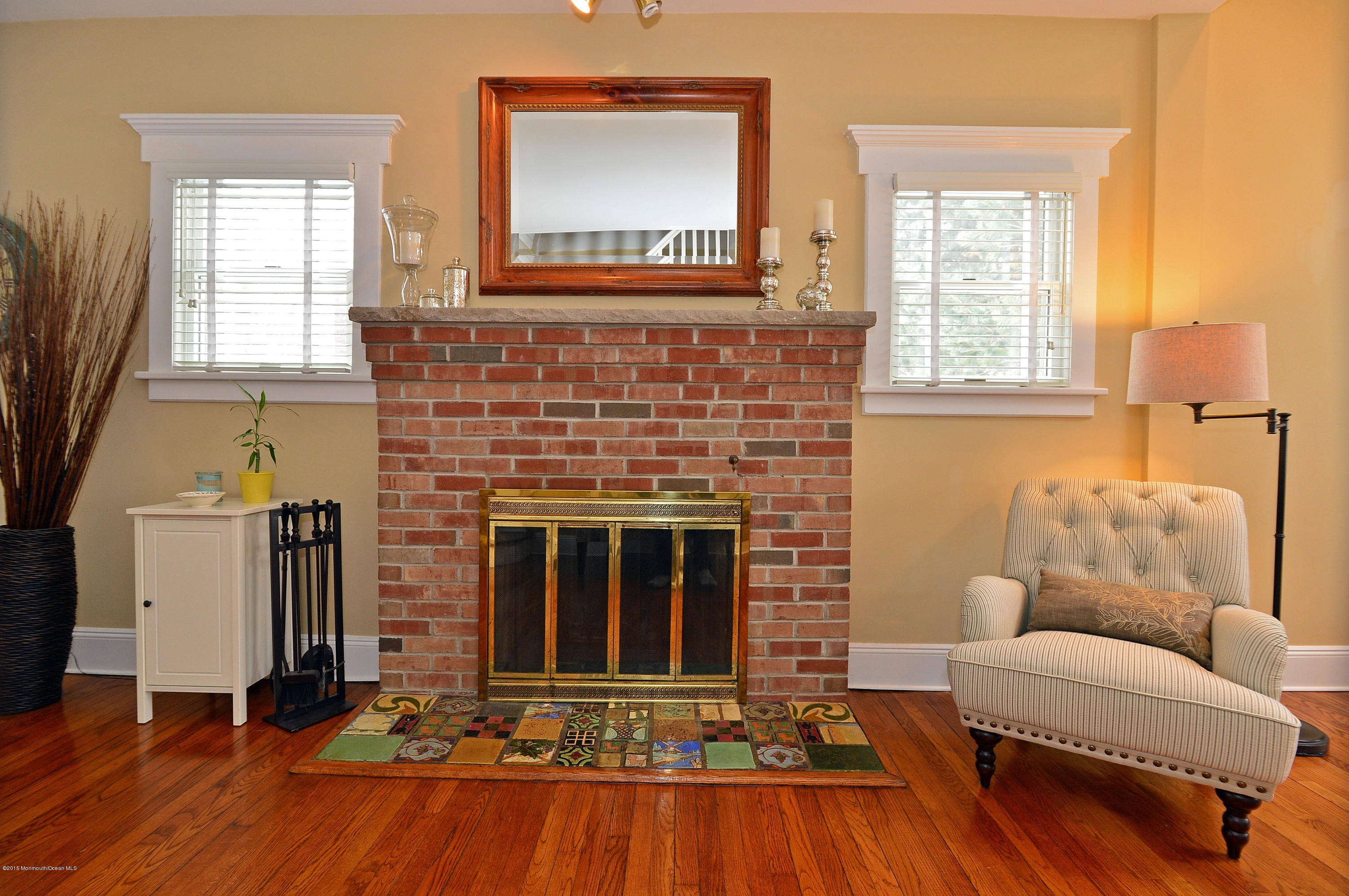 66 Pinckney Road Red Bank, NJ 07701 - Photo 12 of 30 a living room with furniture and a fireplace