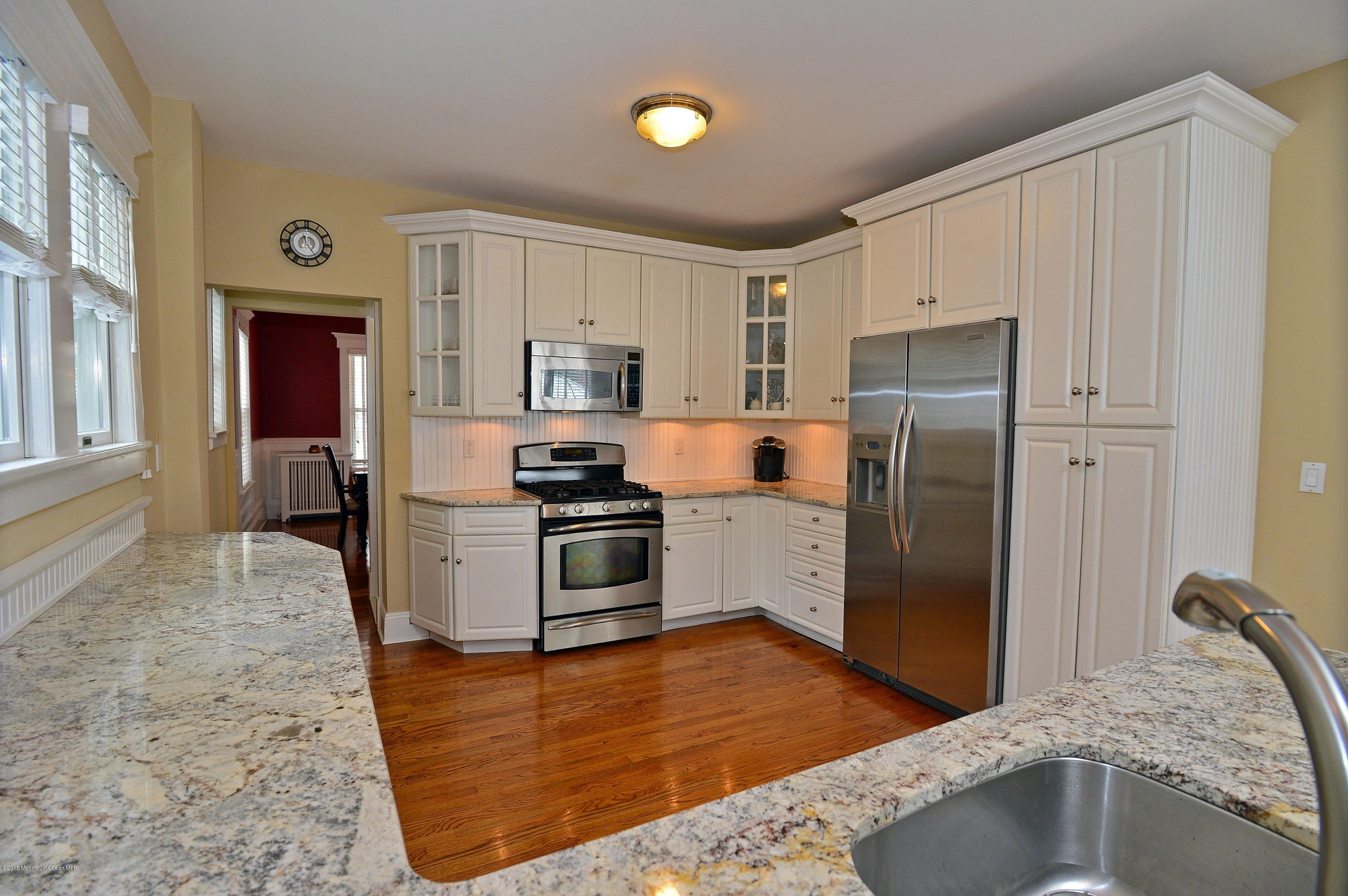 66 Pinckney Road Red Bank, NJ 07701 - Photo 17 of 30 a kitchen with granite countertop a refrigerator and a sink