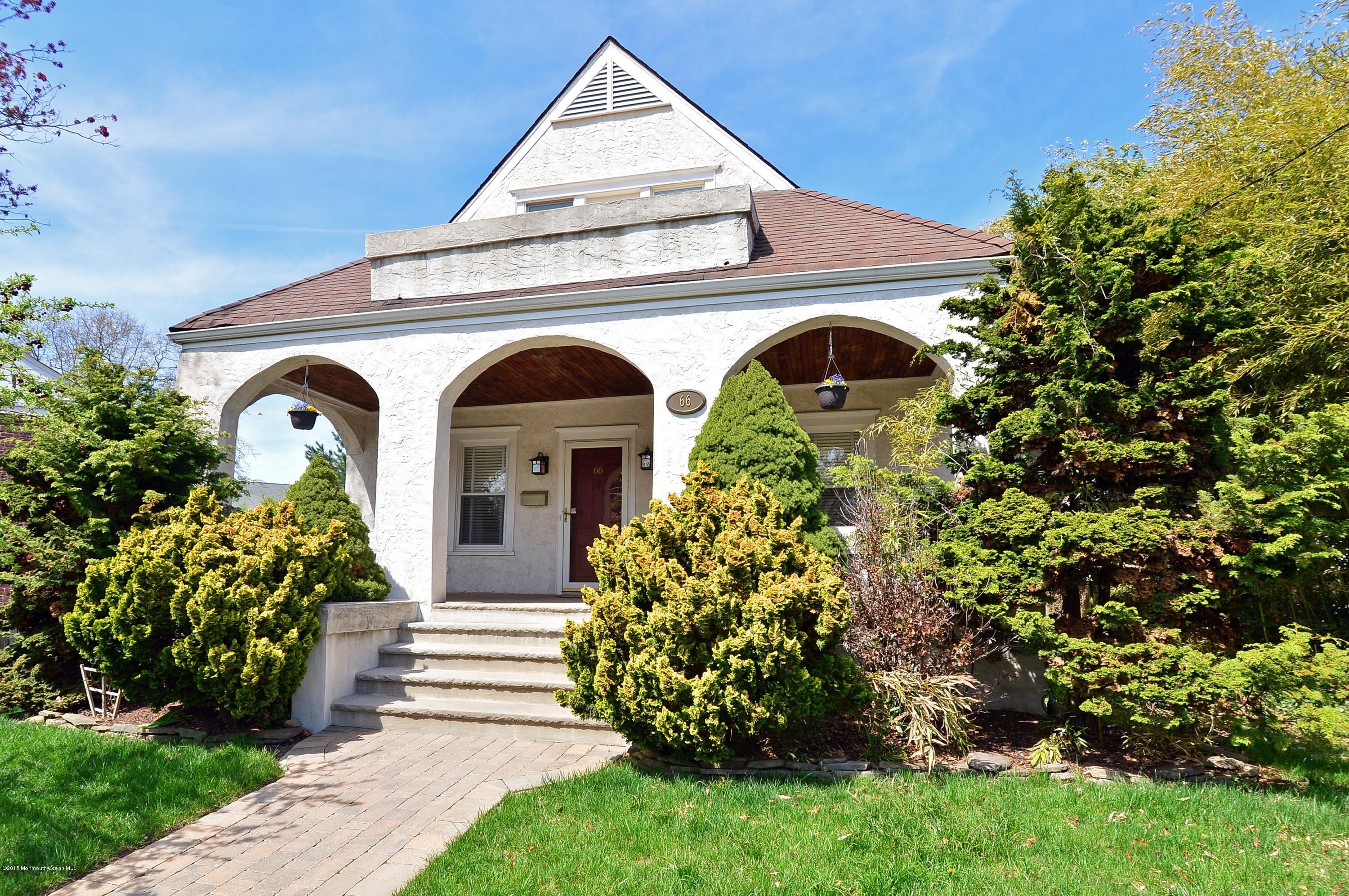 66 Pinckney Road Red Bank, NJ 07701 - Photo 2 of 30 a front view of a house with garden