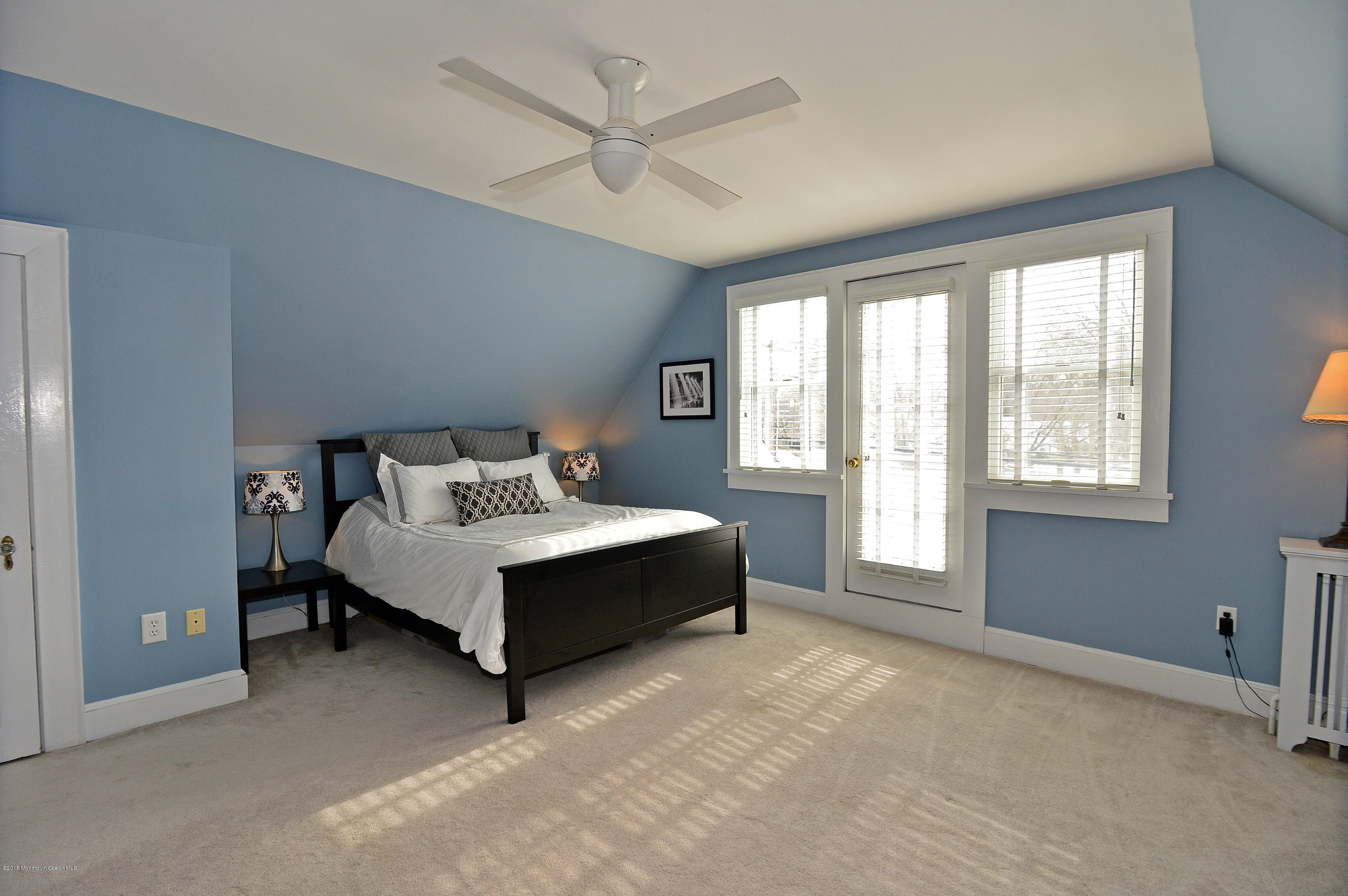 66 Pinckney Road Red Bank, NJ 07701 - Photo 21 of 30 a spacious bedroom with a bed and window