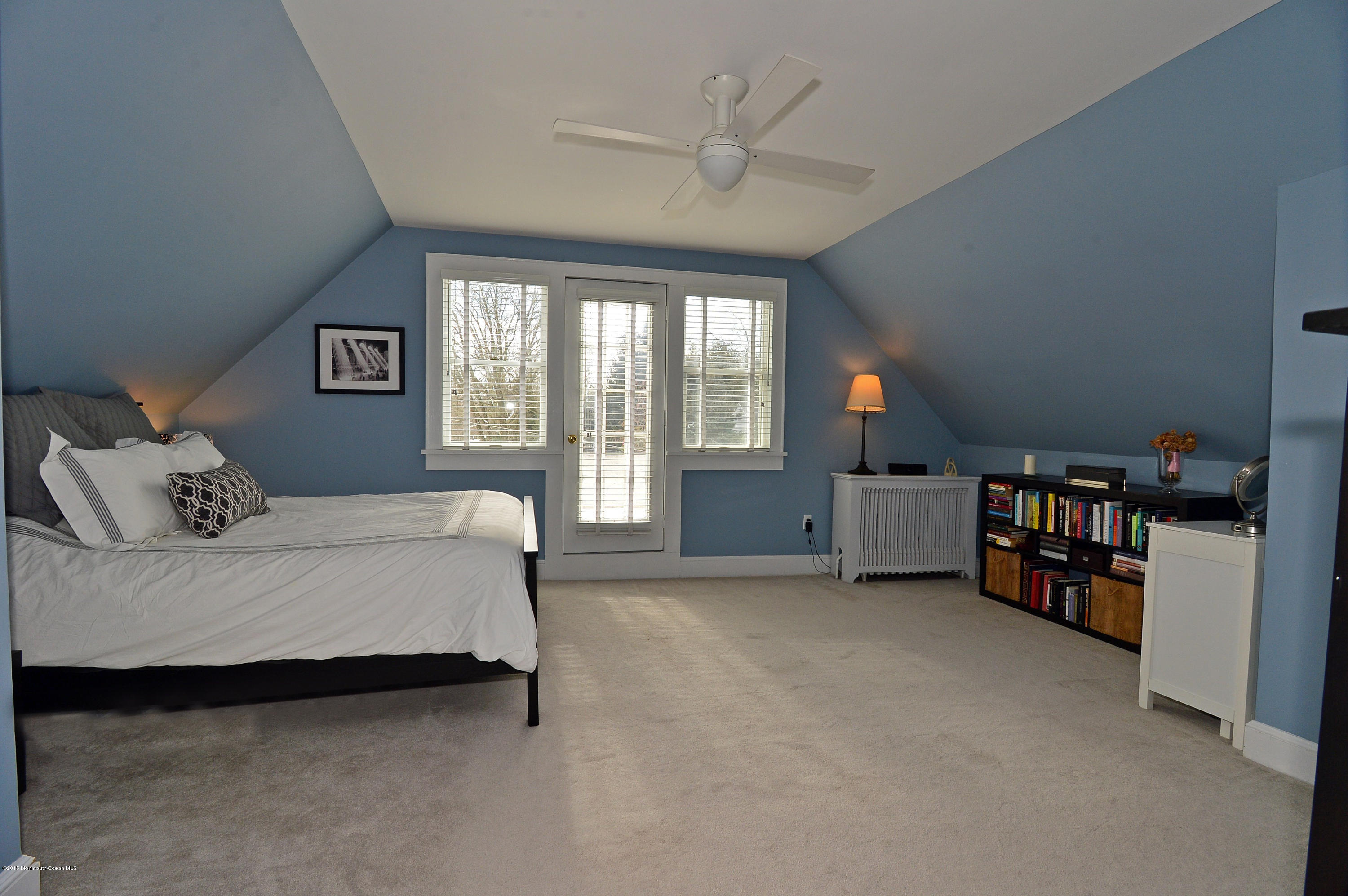 66 Pinckney Road Red Bank, NJ 07701 - Photo 22 of 30 a bedroom with a bed furniture and a large window