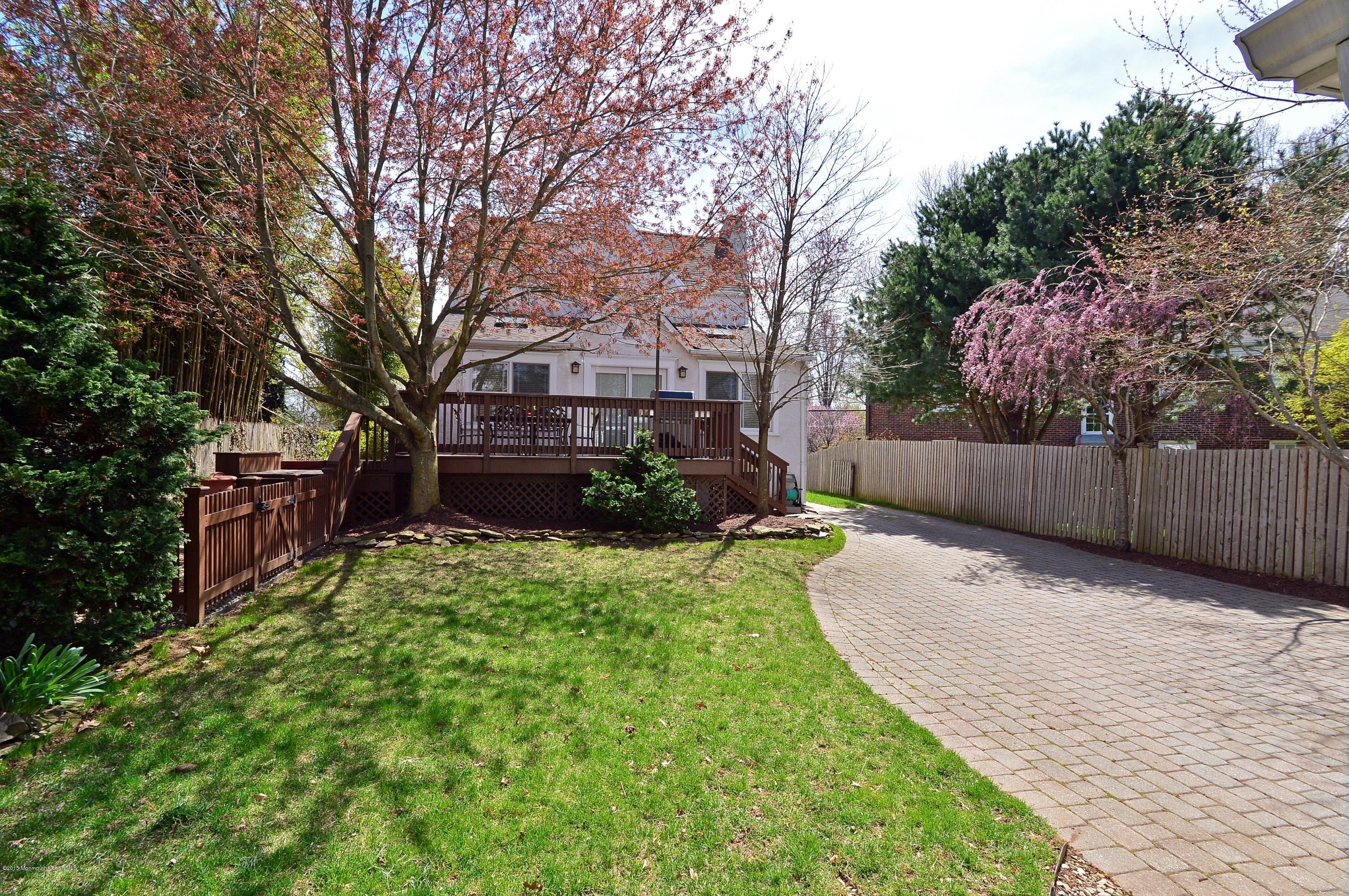 66 Pinckney Road Red Bank, NJ 07701 - Photo 28 of 30 a front view of a house with garden