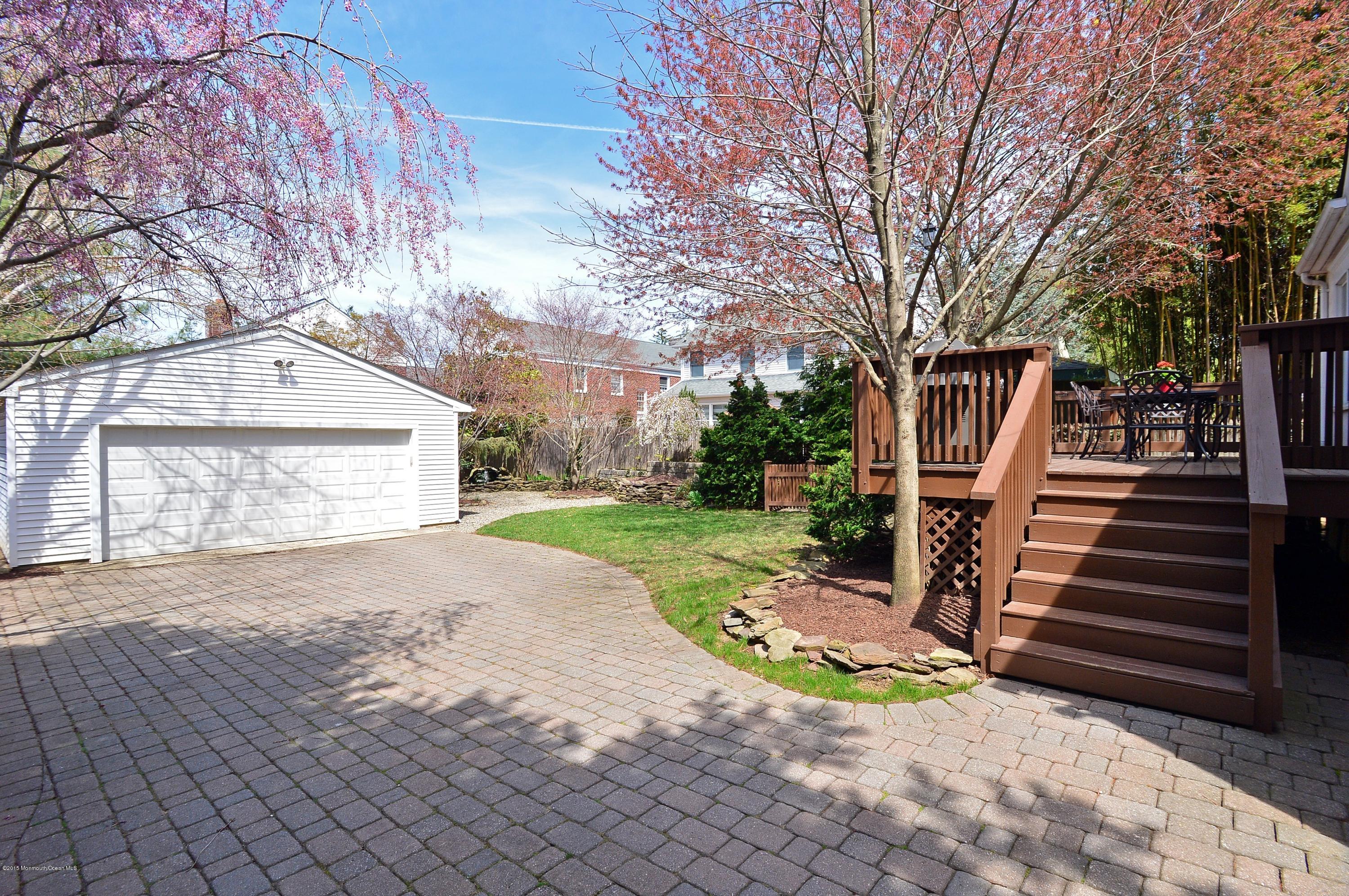 66 Pinckney Road Red Bank, NJ 07701 - Photo 30 of 30 a view of a house with backyard and trees