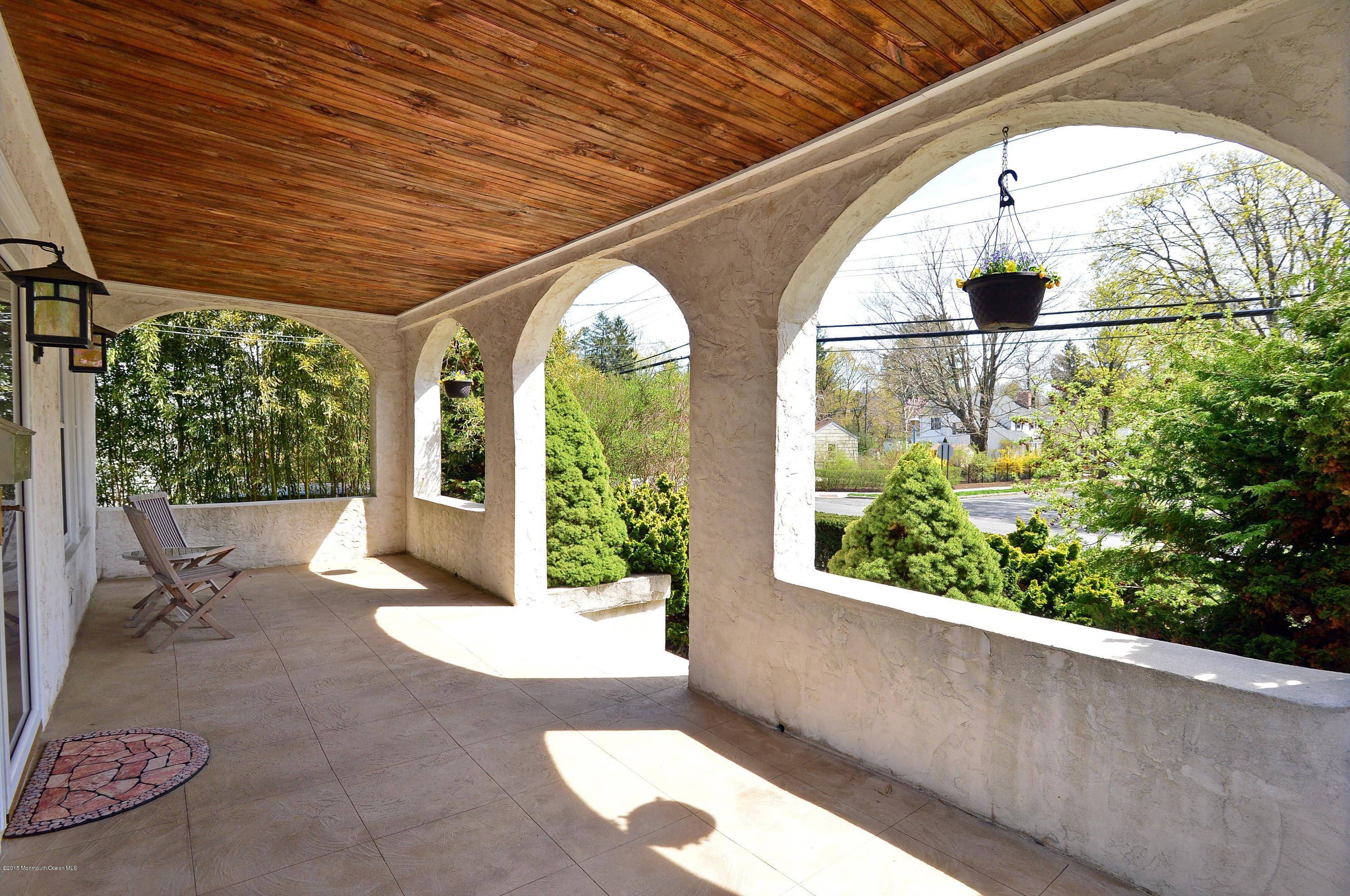 66 Pinckney Road Red Bank, NJ 07701 - Photo 4 of 30 a view of a porch with furniture and garden