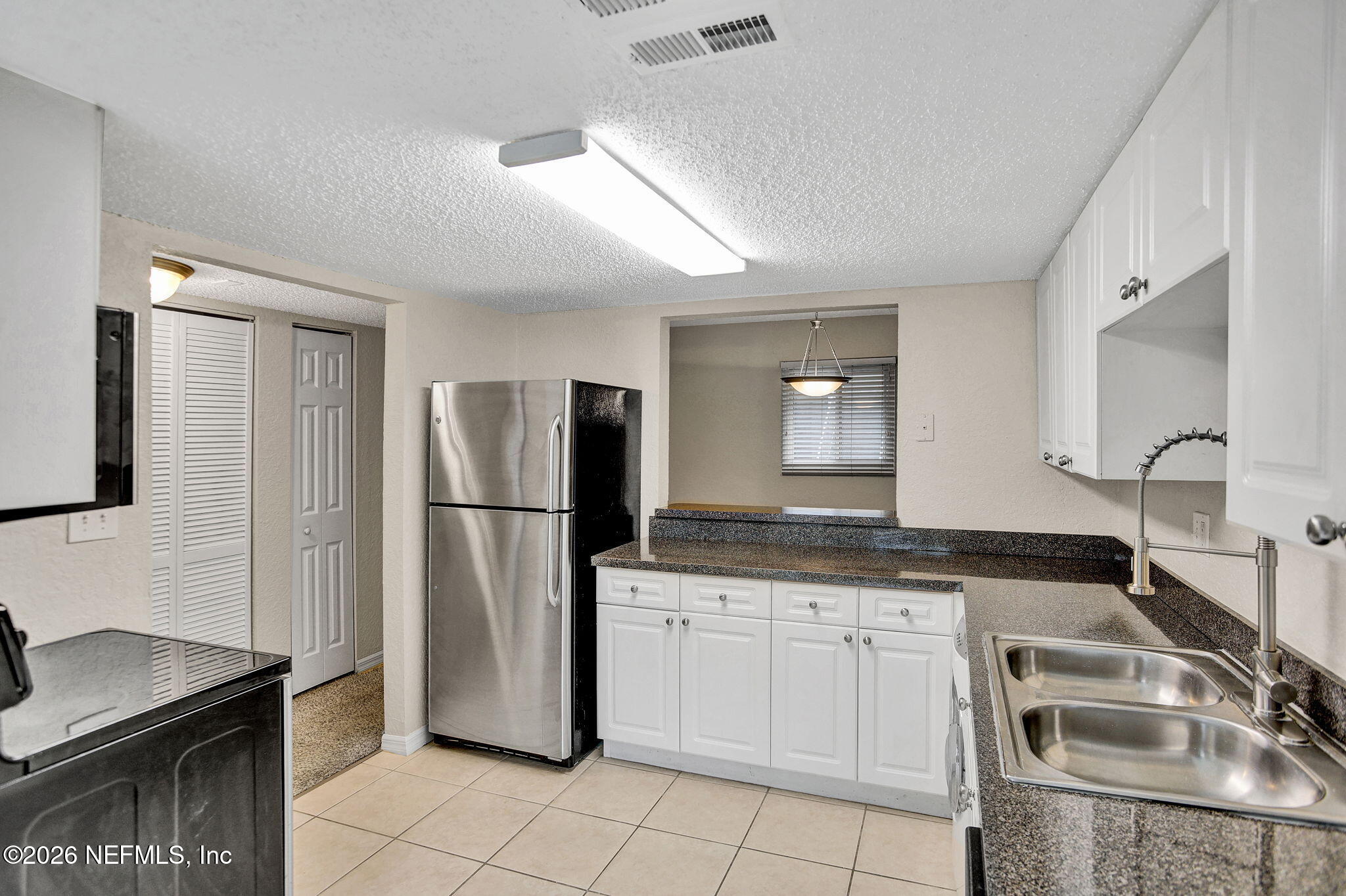 355 Monument Road, Unit 12 A1 Jacksonville, FL 32225 - Photo 5 of 21 11-web-or-mls-IMG_0051