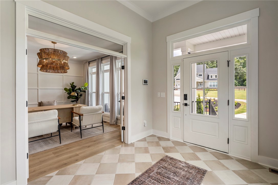 506 Tilman Court Anderson, SC 29621 - Photo 2 of 20 This inviting entryway features a beautiful tile floor and a clear view into a versatile study.