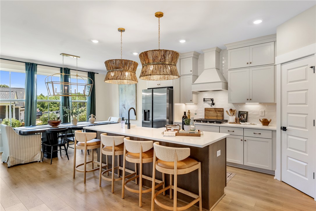 506 Tilman Court Anderson, SC 29621 - Photo 6 of 20 This bright kitchen features an expansive island, offering both functionality and a welcoming gathering space.