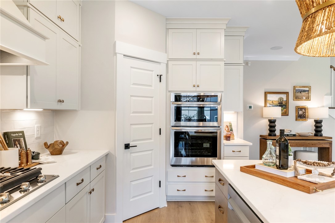 506 Tilman Court Anderson, SC 29621 - Photo 8 of 20 Bright and inviting kitchen with built-in appliances and a seamless flow for effortless entertaining.