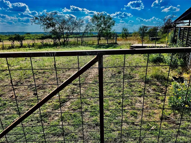 a view of swimming pool from a balcony