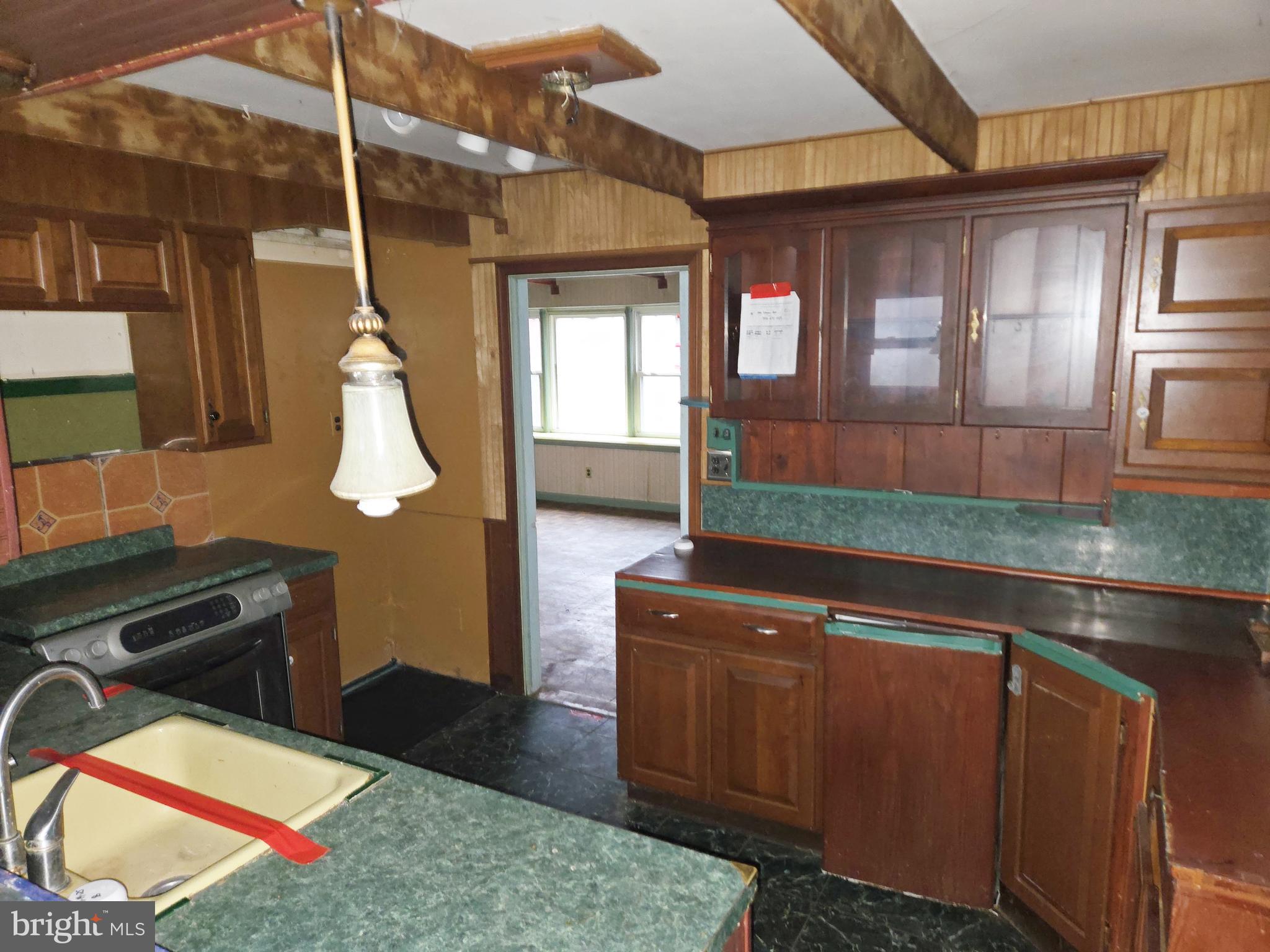 1001 Wayne Road Haddonfield, NJ 08033 - Photo 13 of 34 a kitchen that has a sink and a stove