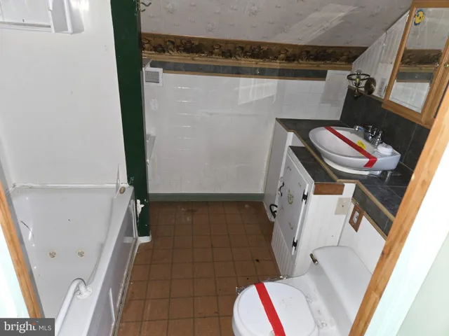 an empty room with a bench