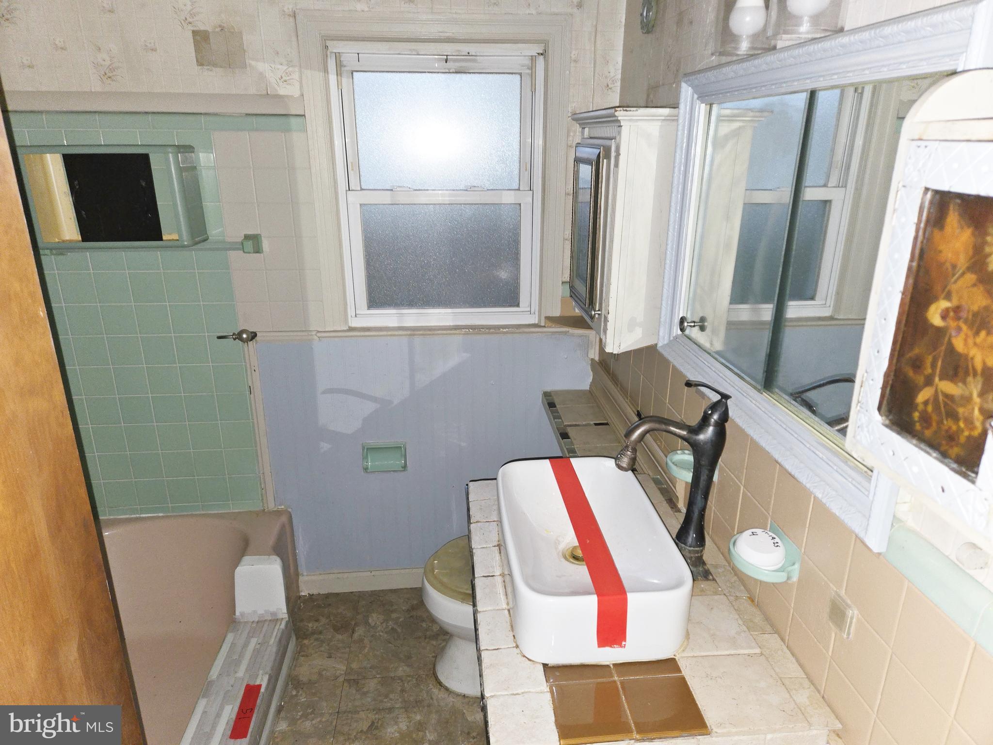 1001 Wayne Road Haddonfield, NJ 08033 - Photo 28 of 34 a bathroom with a sink toilet and shower