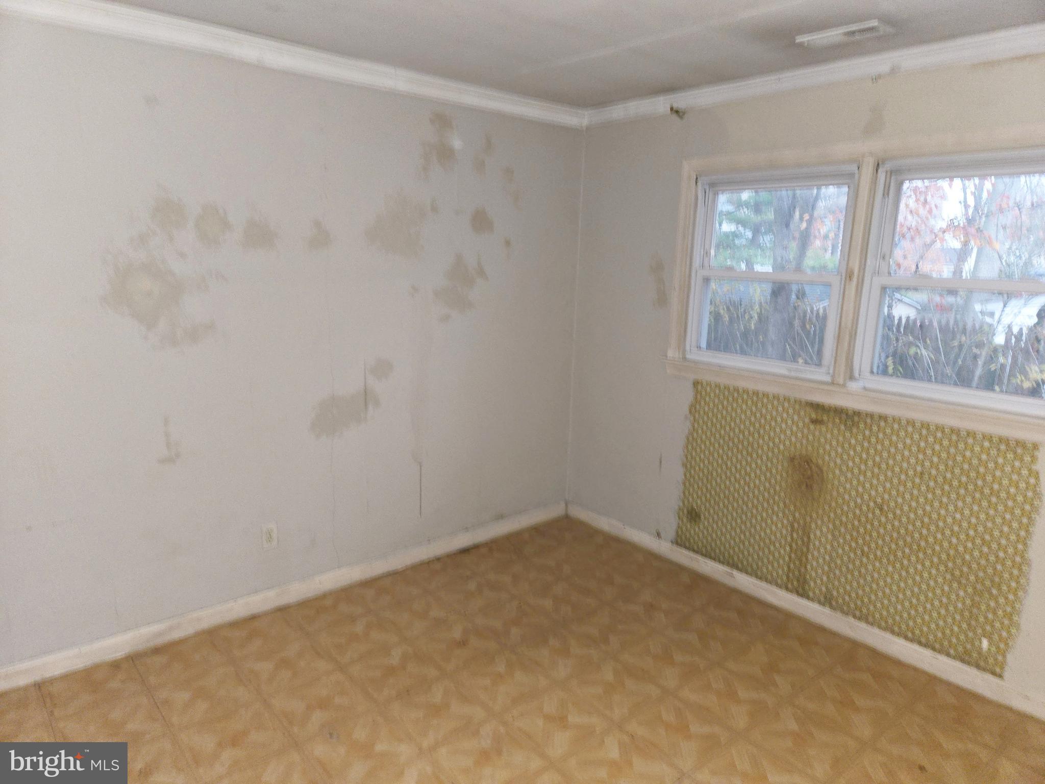 1001 Wayne Road Haddonfield, NJ 08033 - Photo 29 of 34 wooden floor in an empty room with a window