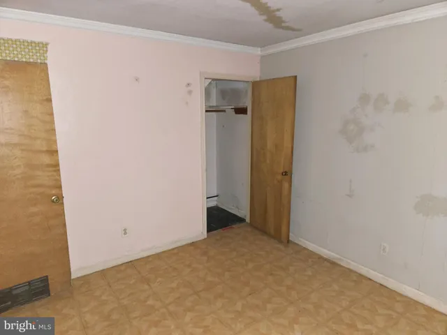 a view of a room with a window