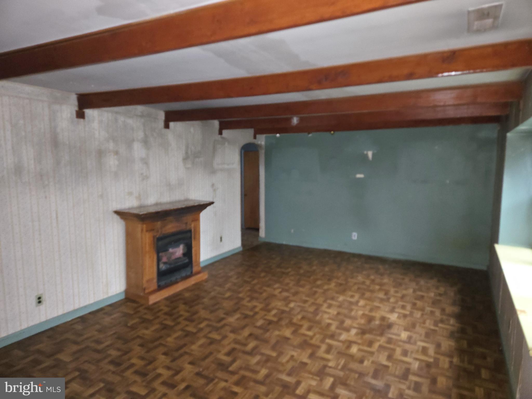 1001 Wayne Road Haddonfield, NJ 08033 - Photo 3 of 34 a view of empty room with a fireplace