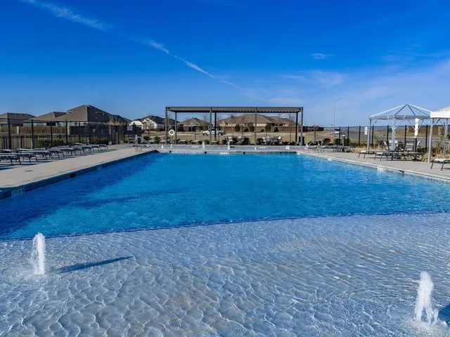 a view of a living room with furniture
