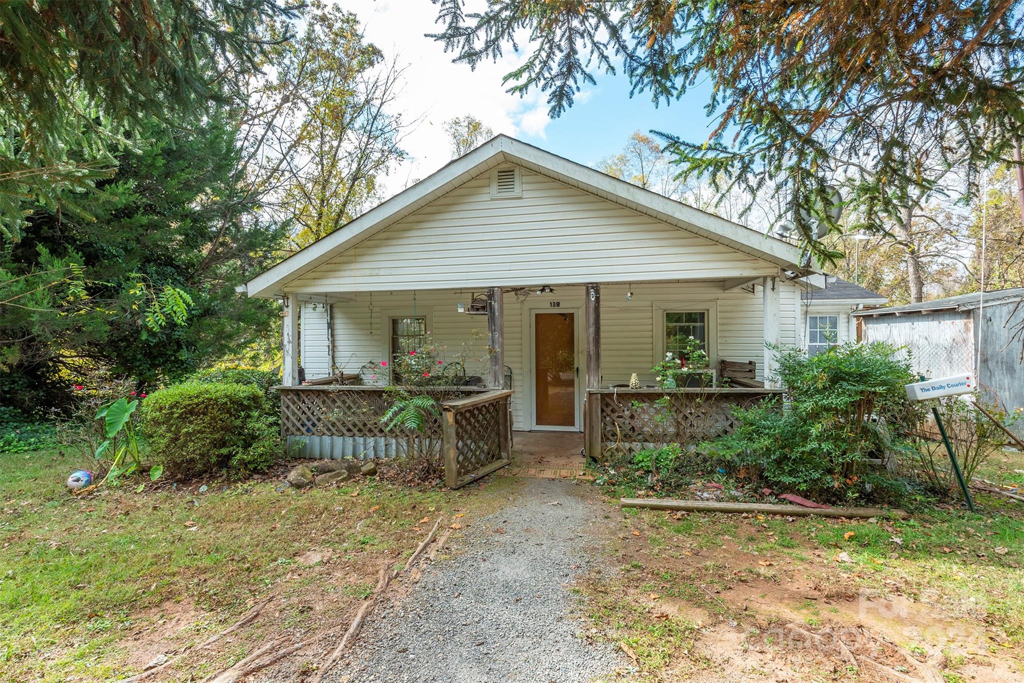 139 Hickory Street Rutherfordton, NC 28139 - Photo 1 of 19 a view of an house with backyard space and garden