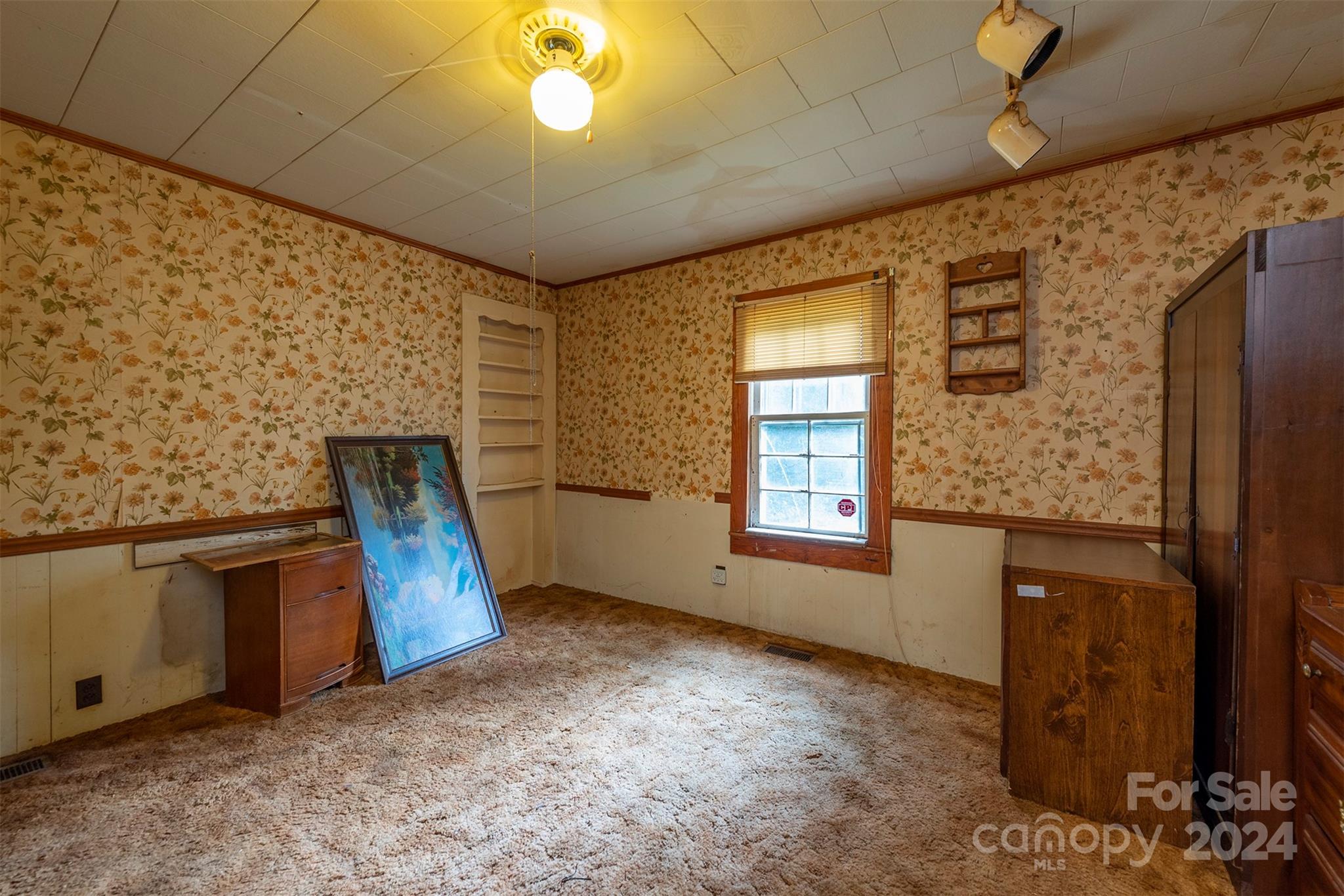 139 Hickory Street Rutherfordton, NC 28139 - Photo 14 of 19 a view of an empty room with windows