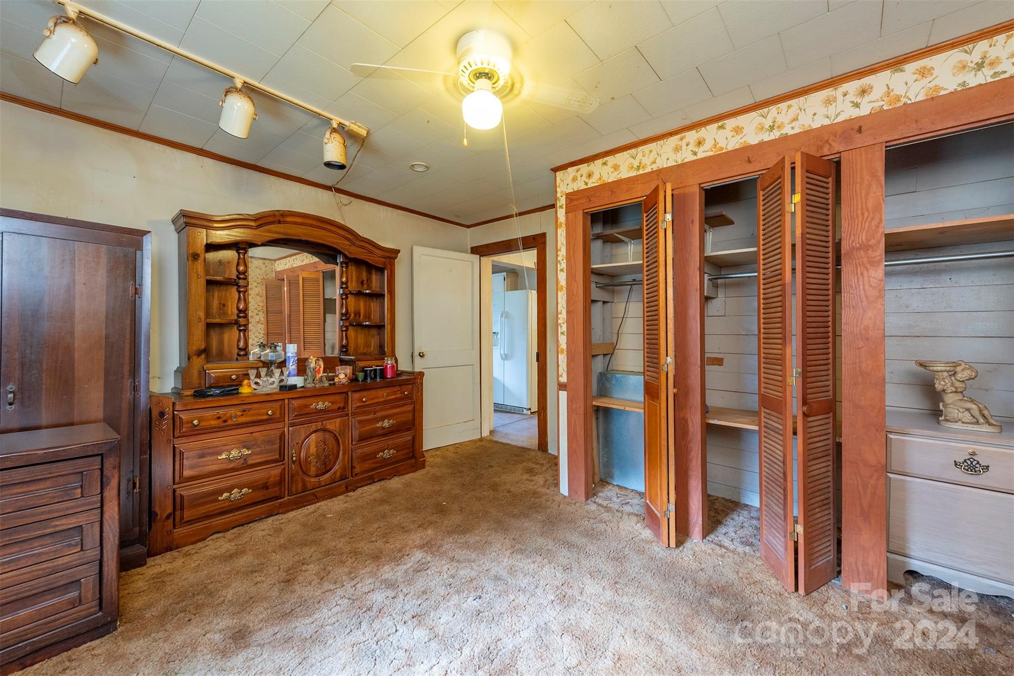 139 Hickory Street Rutherfordton, NC 28139 - Photo 15 of 19 a large bedroom with a large bed and a dresser