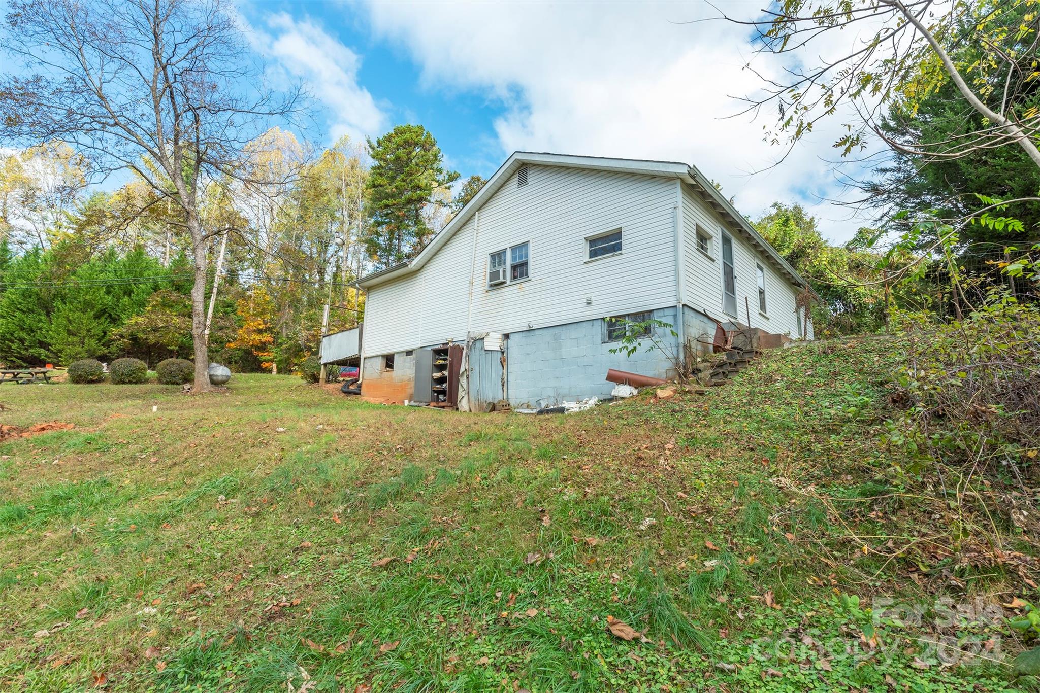 139 Hickory Street Rutherfordton, NC 28139 - Photo 16 of 19 a view of a house with a yard