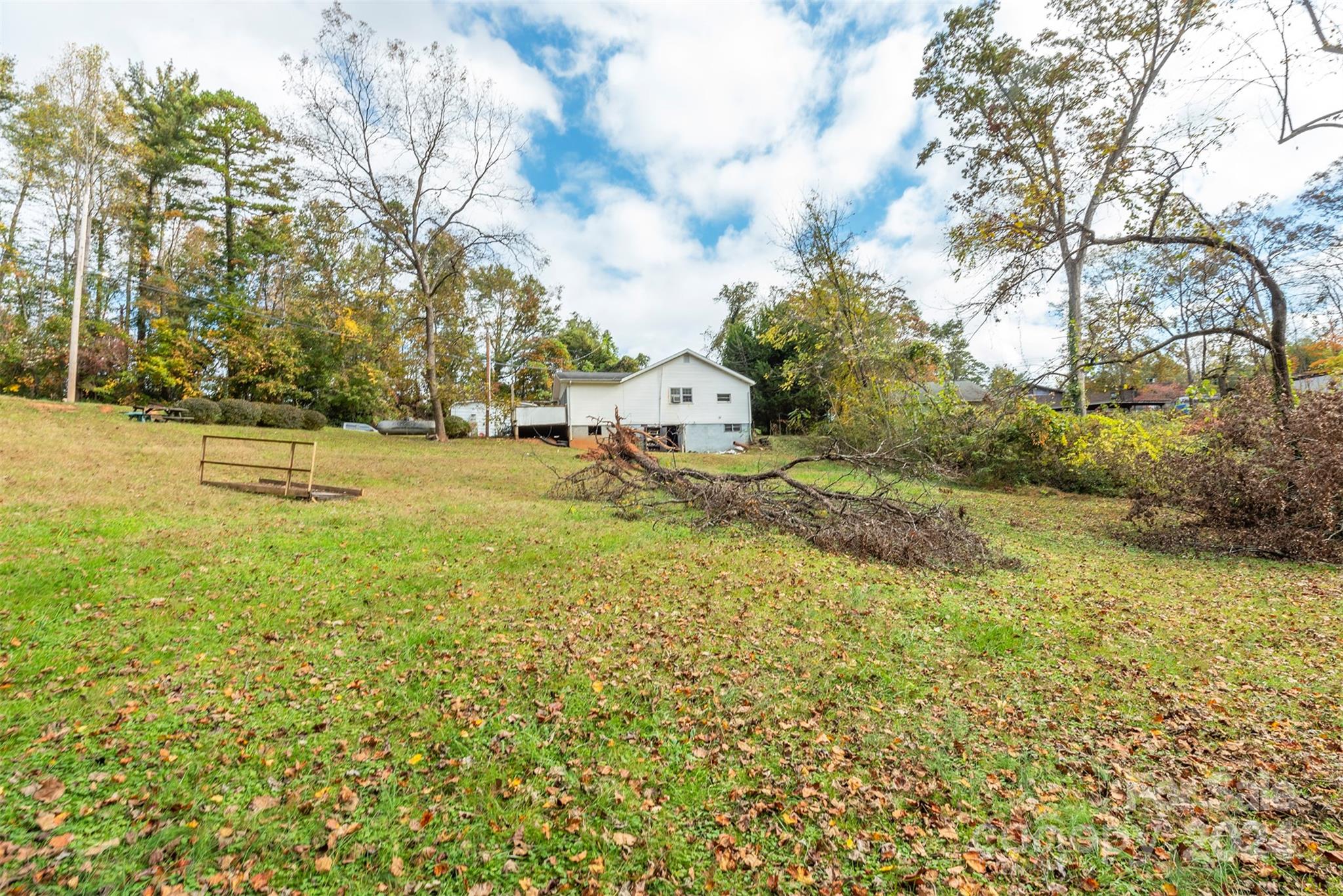 139 Hickory Street Rutherfordton, NC 28139 - Photo 17 of 19 a view of yard with swimming pool and green space