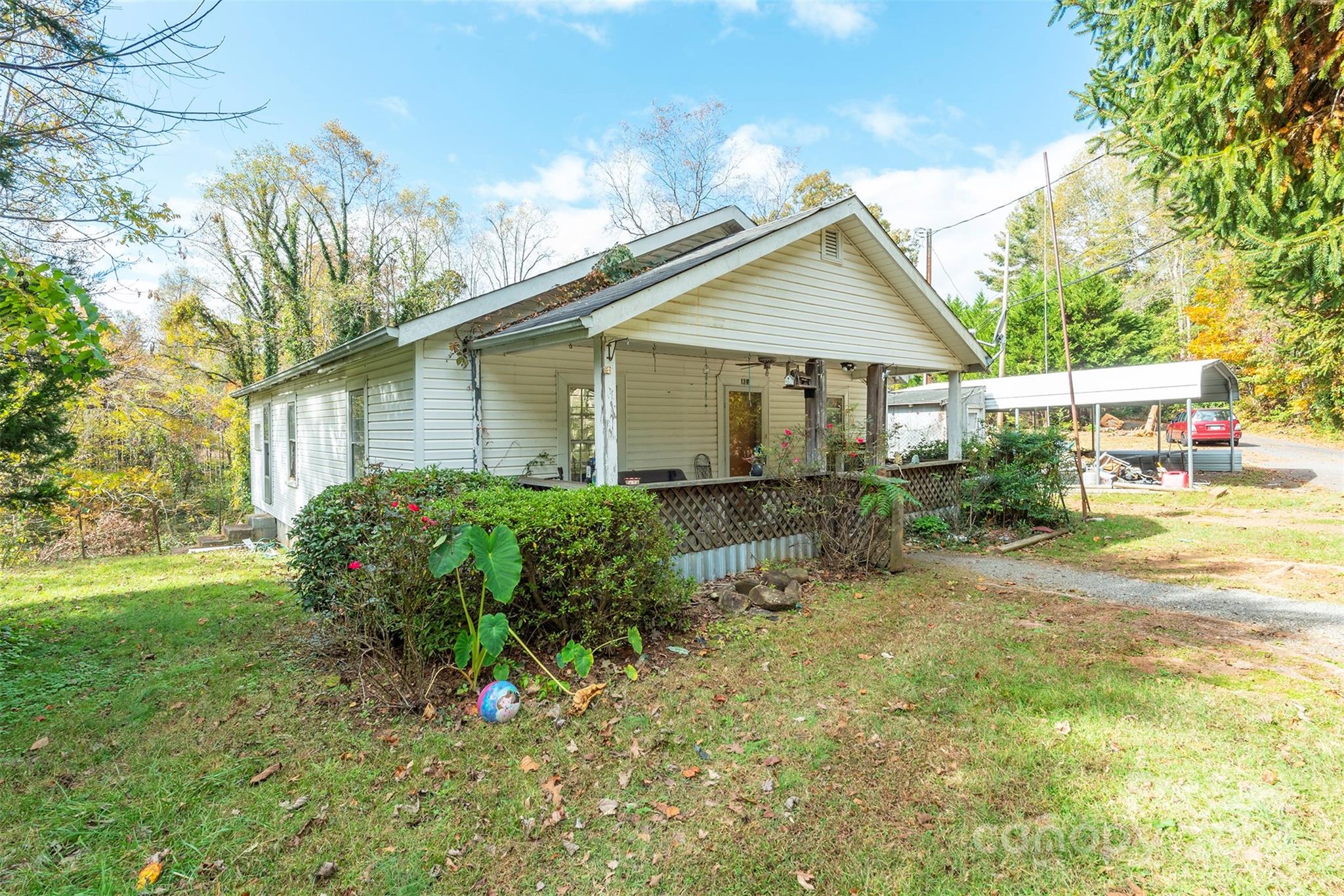 139 Hickory Street Rutherfordton, NC 28139 - Photo 2 of 19 a view of backyard with a garden and plants