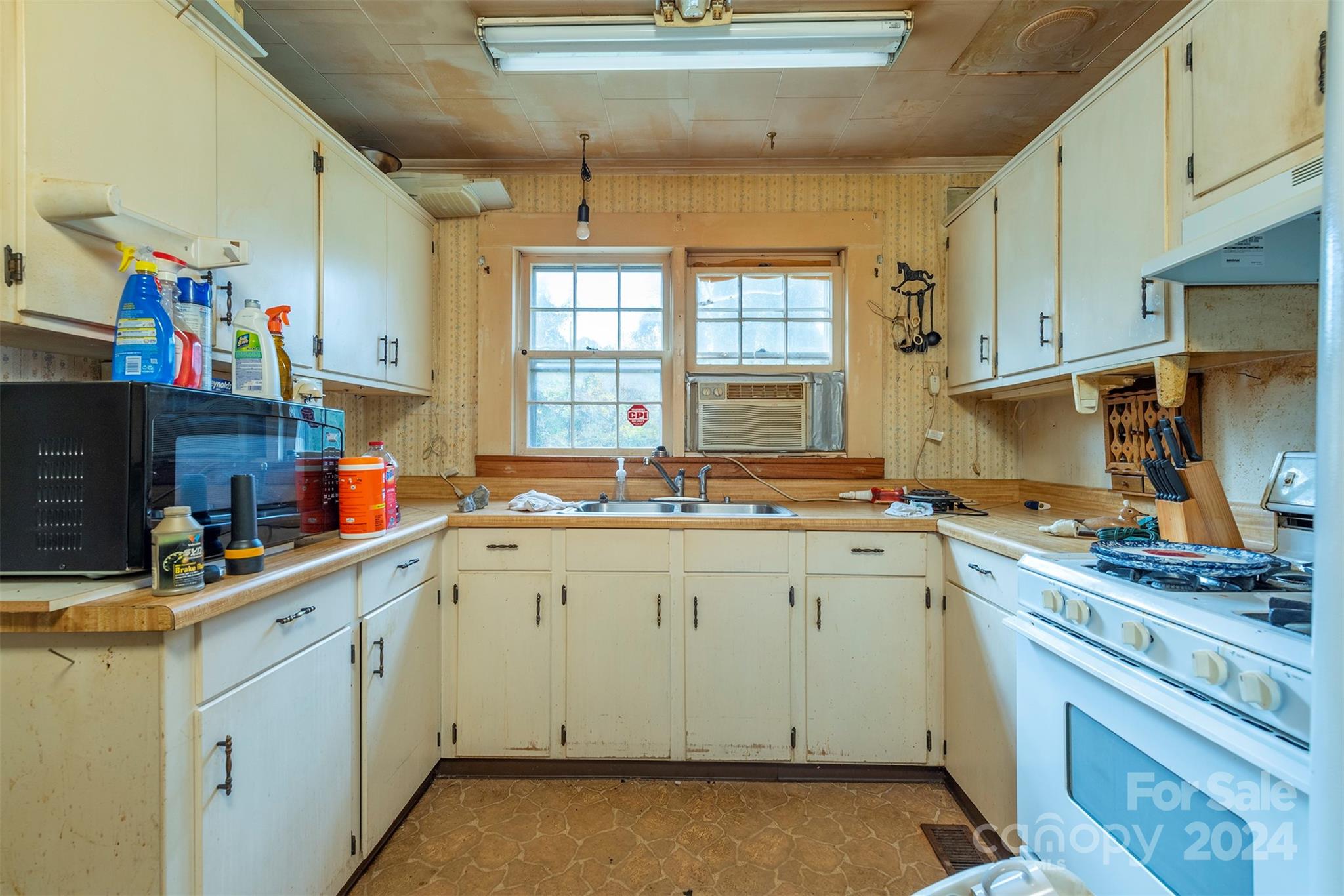 139 Hickory Street Rutherfordton, NC 28139 - Photo 8 of 19 a kitchen that has a sink and a stove in it
