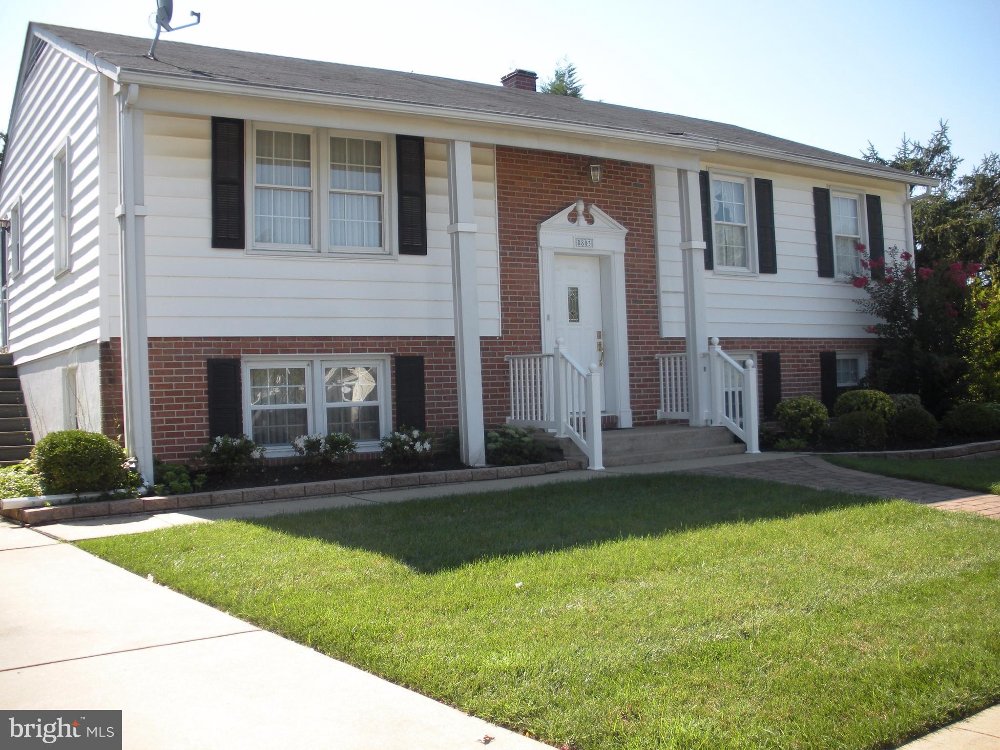 8803 Parlo Road Baltimore, MD 21236 - Photo 1 of 29 a front view of a house with a yard