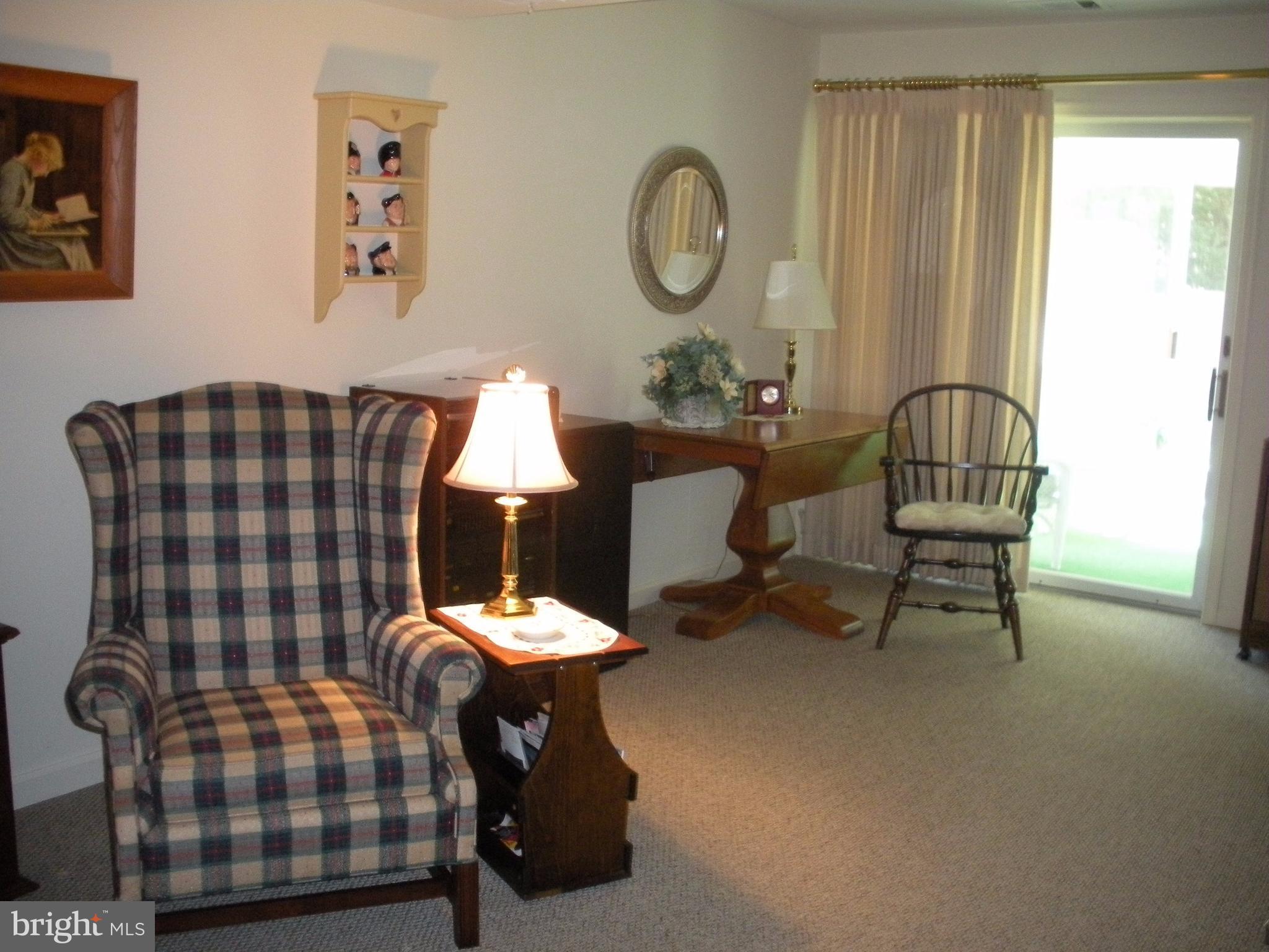 8803 Parlo Road Baltimore, MD 21236 - Photo 19 of 29 a living room with furniture and a window