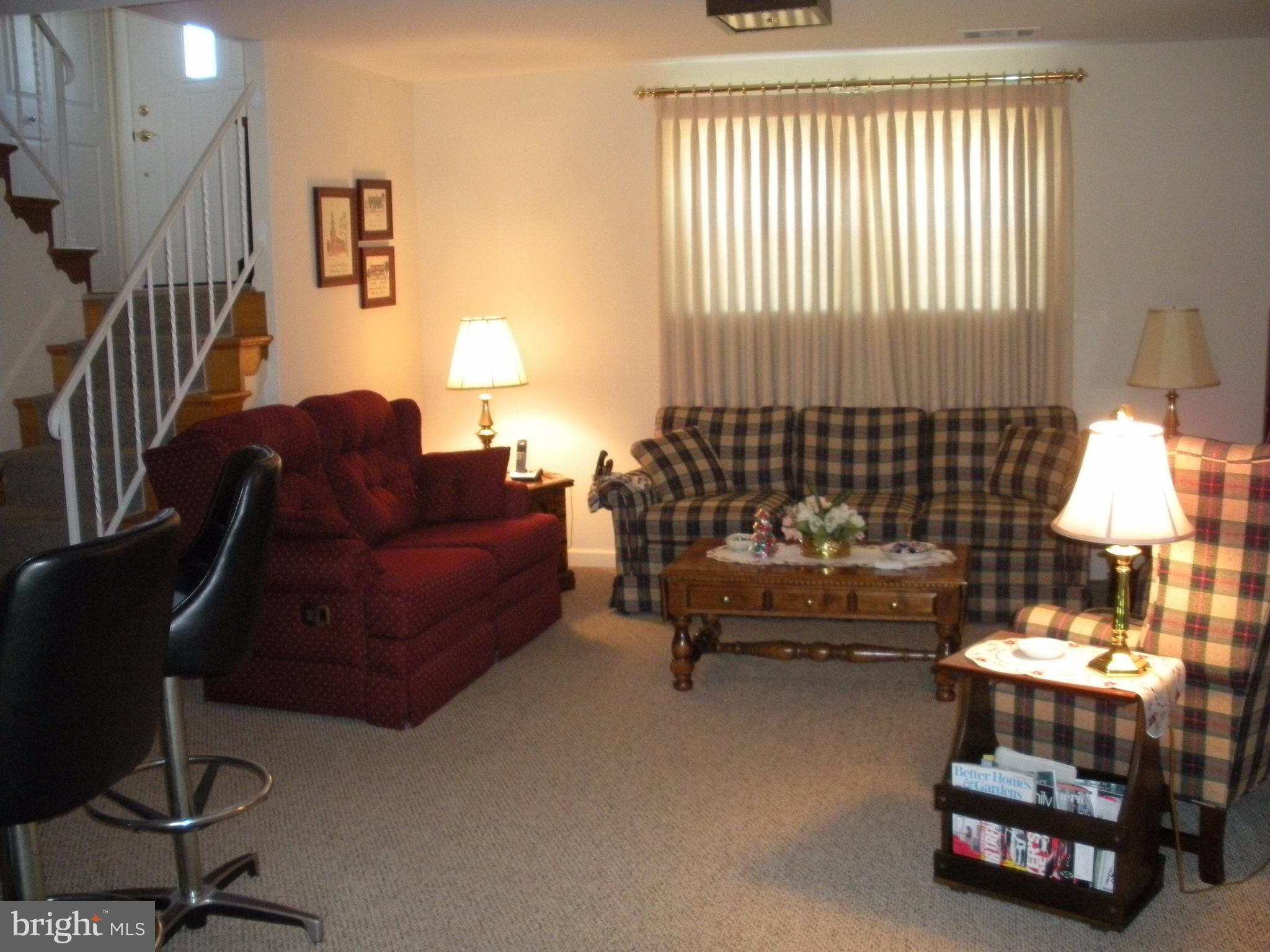 8803 Parlo Road Baltimore, MD 21236 - Photo 21 of 29 a living room with furniture and a window
