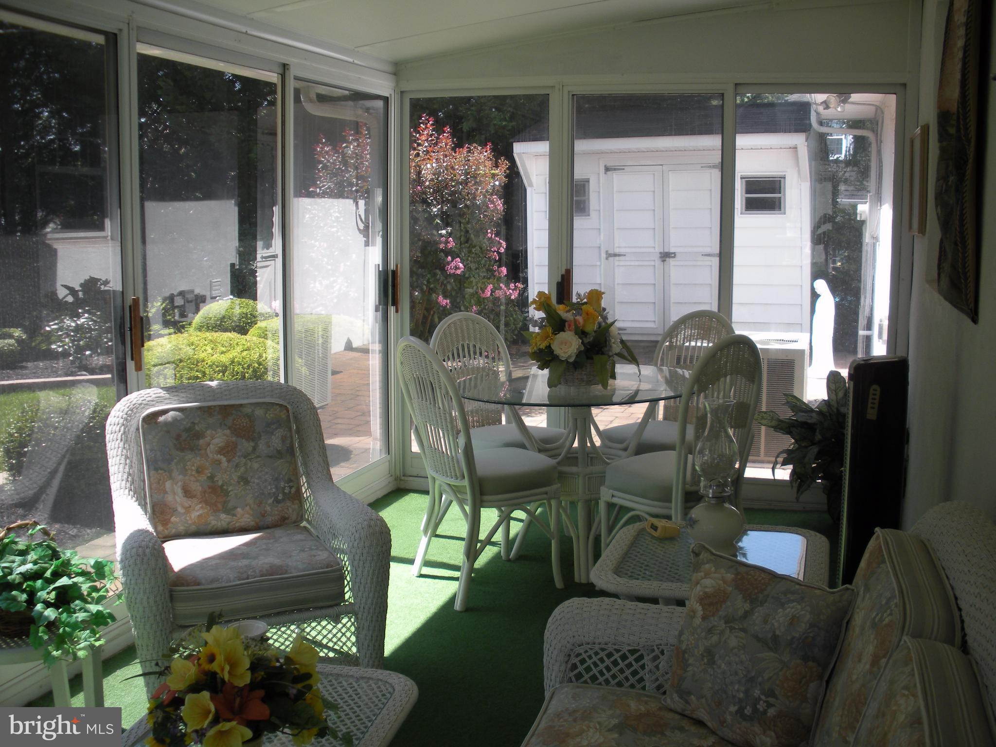 8803 Parlo Road Baltimore, MD 21236 - Photo 22 of 29 a outdoor living space with furniture and a potted plant