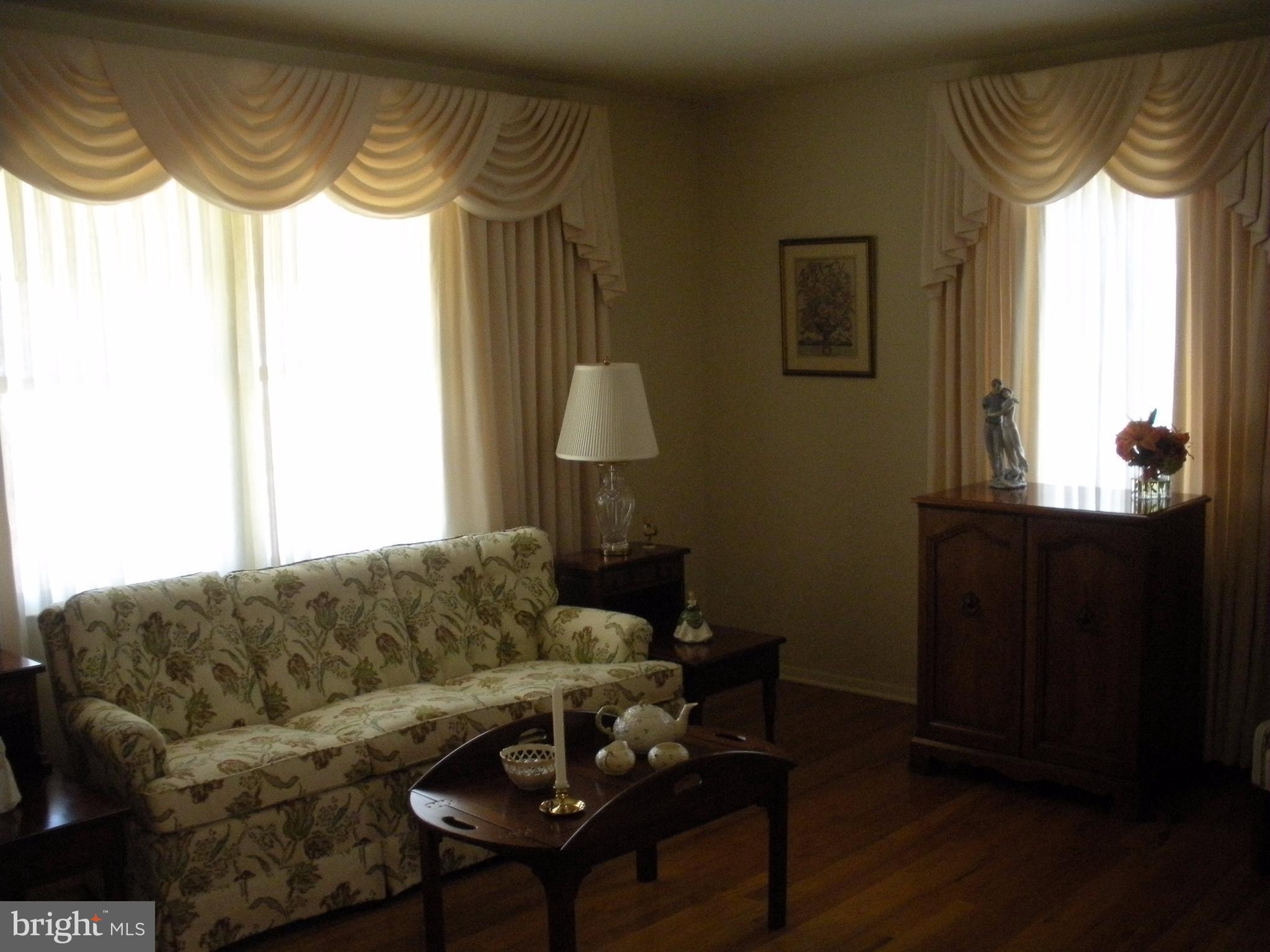 8803 Parlo Road Baltimore, MD 21236 - Photo 8 of 29 a living room with furniture and a window