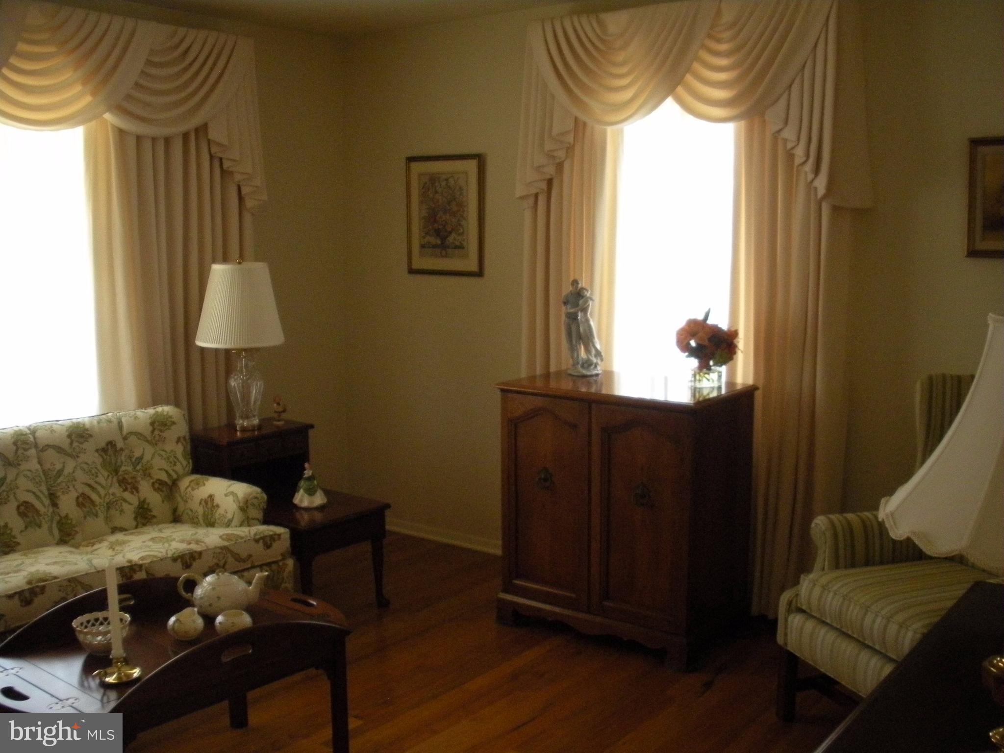 8803 Parlo Road Baltimore, MD 21236 - Photo 9 of 29 a living room with furniture and a window