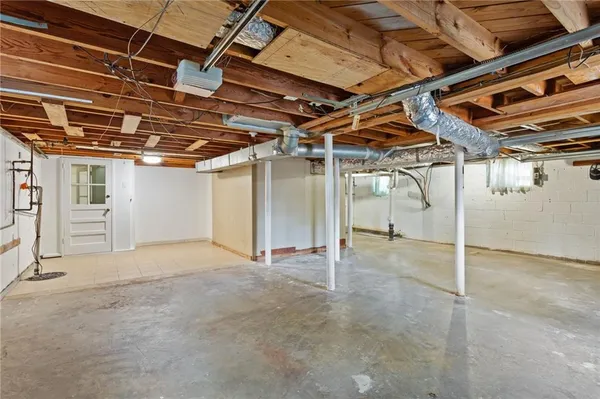 a view of a room with wooden walls