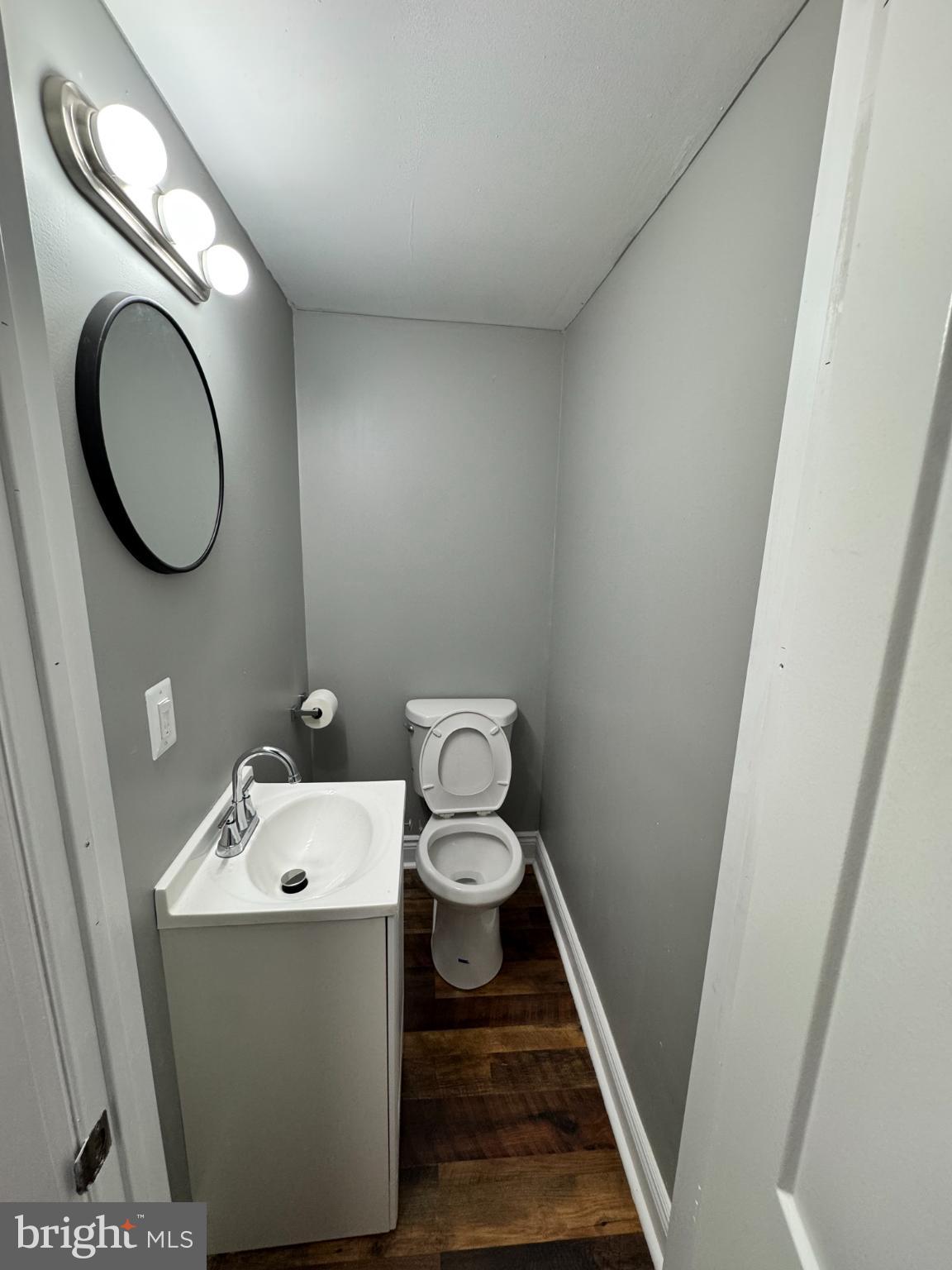 1908 West Somerset Street Philadelphia, PA 19132 - Photo 7 of 10 a bathroom with a sink and a mirror