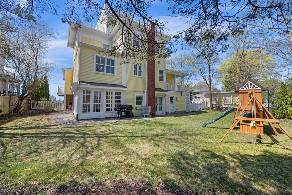 90 Puritan Road Swampscott, MA 01907 - Photo 4 of 42 a view of a house with a yard