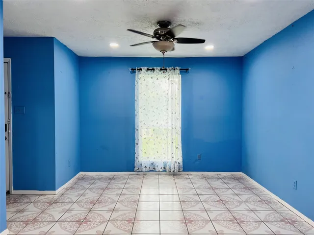 a view of livingroom with furniture and windows